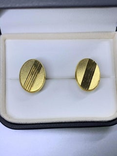 Gemelli da polso in oro giallo 22ct di forma ovale a tinta unita per uomo.