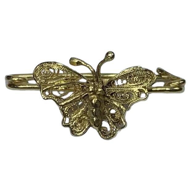 Broche de mariposa liso de oro amarillo de 22 ct.