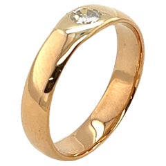 22 Karat Gelbgold Ehering mit 1 rundem Diamant, 0,17 Karat