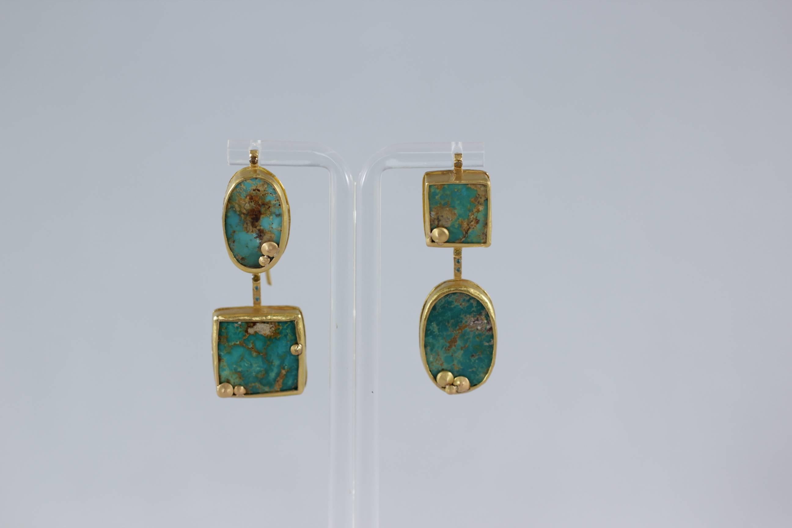 In Stock. Scheherazade Earrings. Elegant and exotic, blue with brown veins Persian Turquoise are bezel set in these minimalist earrings. Flush set brown and blue diamonds add sophistication to the design while keeping it modern.

-21k gold, 18k ear