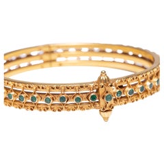 Pulsera brazalete de oro de 18 quilates y esmeraldas, India