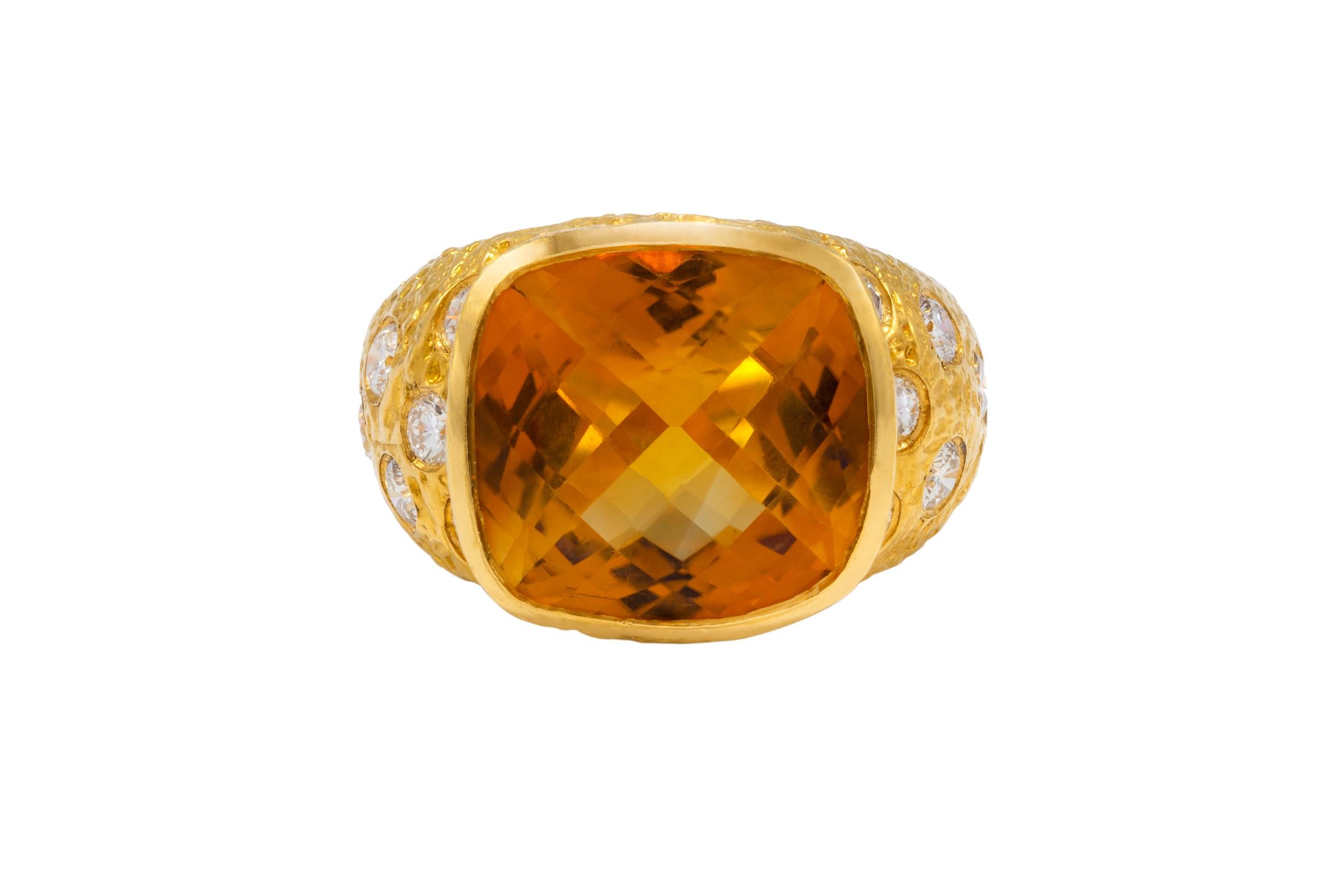 This 22k Gold Citrine Birthstone Cocktail Ring is a stunner! Features a central Citrine set in a bezel that sits a top a classic dome ring with scattered diamonds throughout dome of ring. The different heights, stones and texture makes it a truly