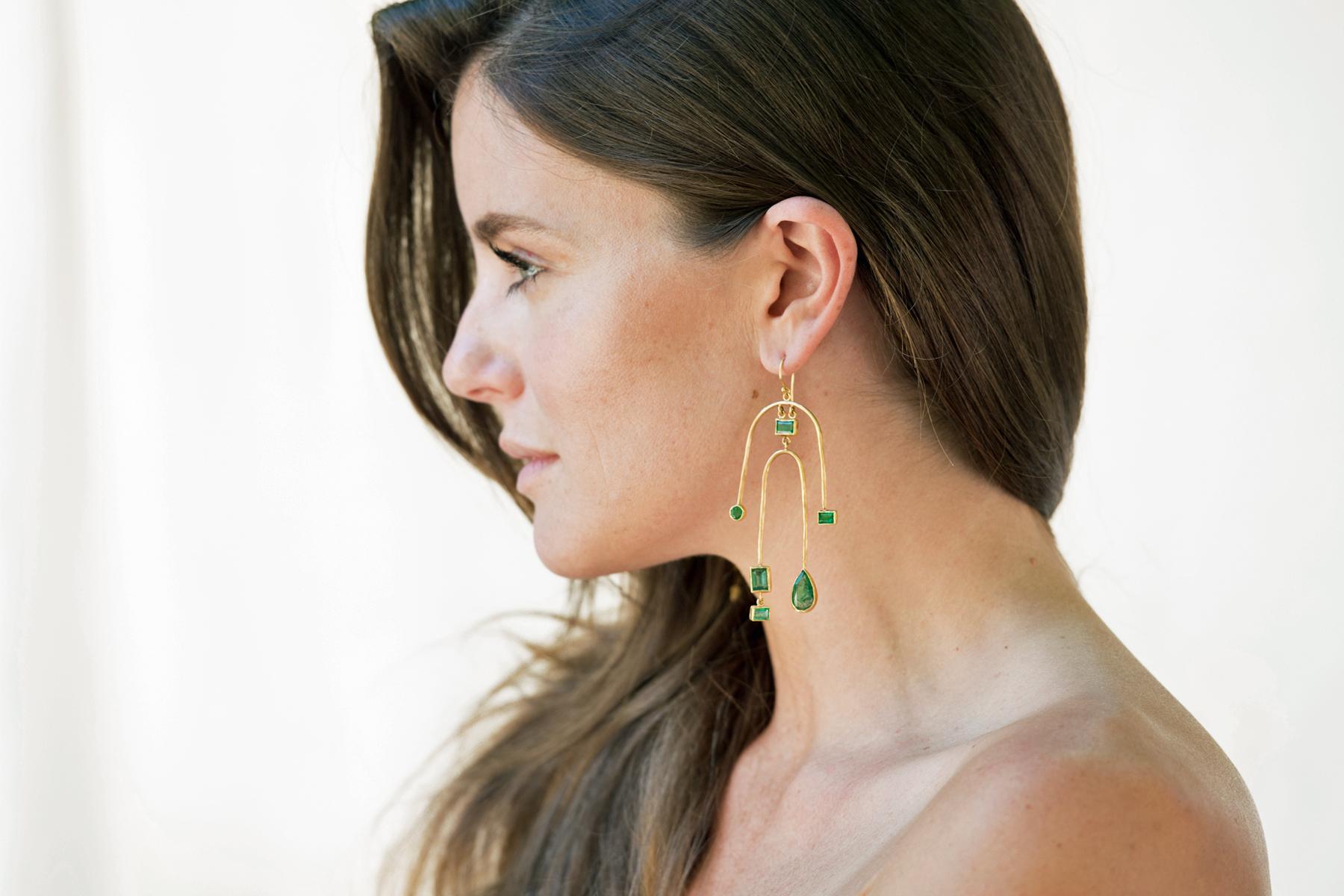 This one of a kind pair of earrings is part of our Artemis Collection.  The collection has its roots in mid century modern aesthetic with a very modern approach. We believe the collection reflects the modernity, strength, and individuality that