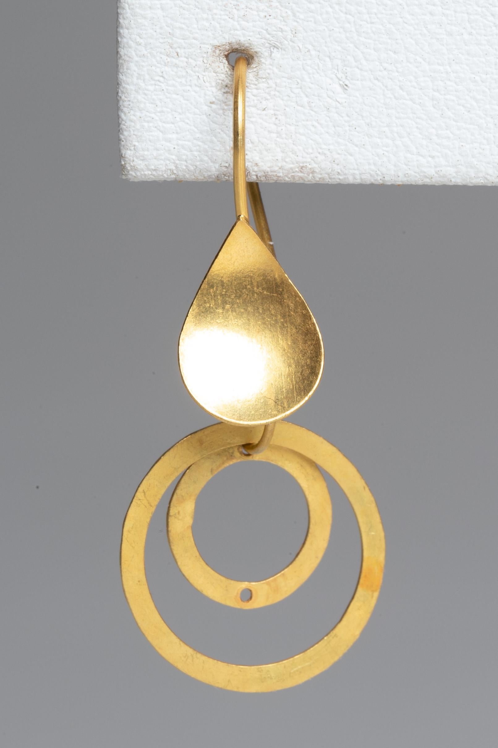 22K gold drop earrings with a matte finish.  Circles withicircles with spade-shape French wire for pierced ears.