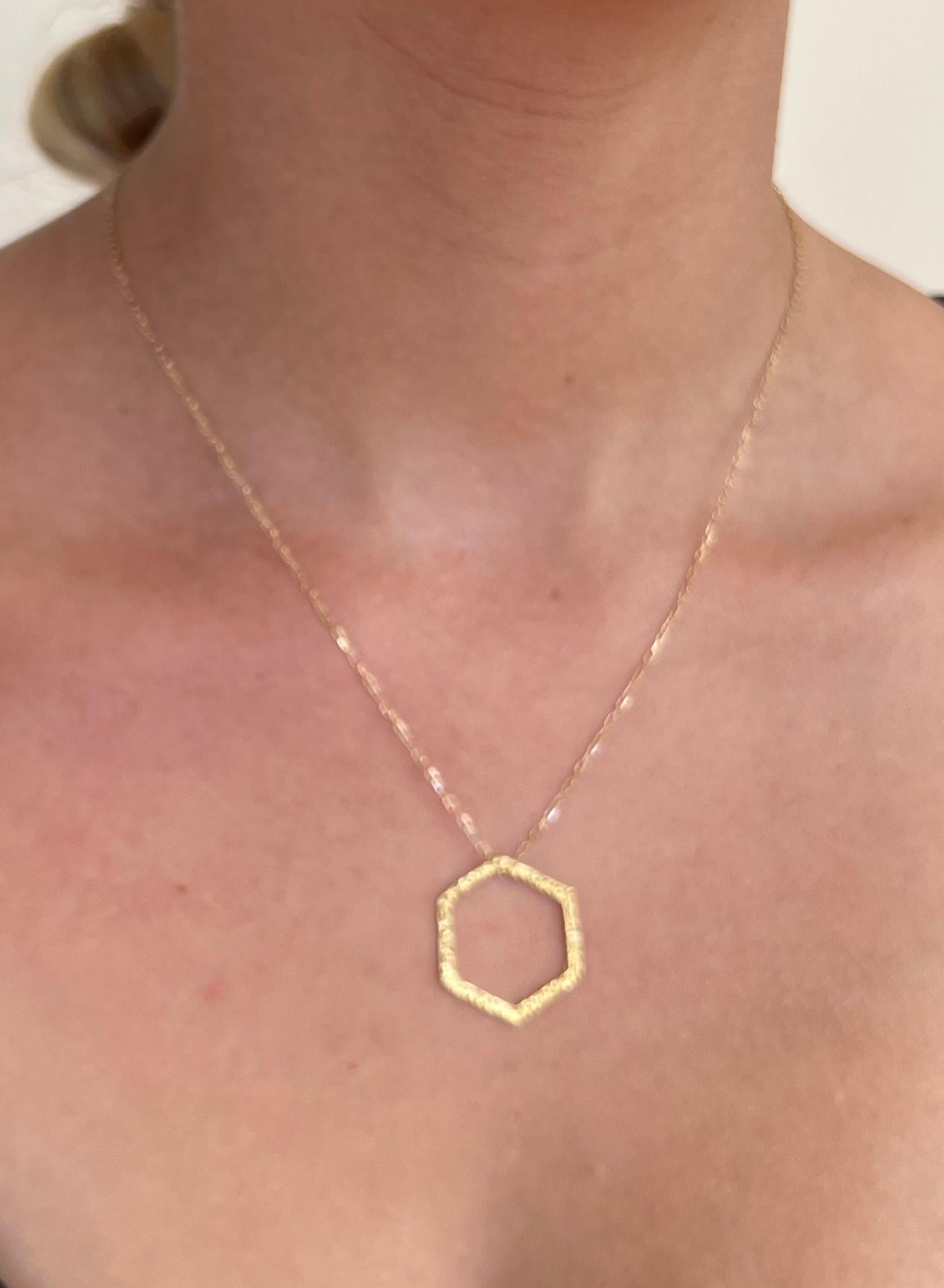 This delicate handmade 22k gold Hexagon necklace is perfect for everyday wear. Its light, delicate and makes a statement with the rich color of 22k gold and Tagili's signature finish. Perfect for layering. Comes on an adjustable 18