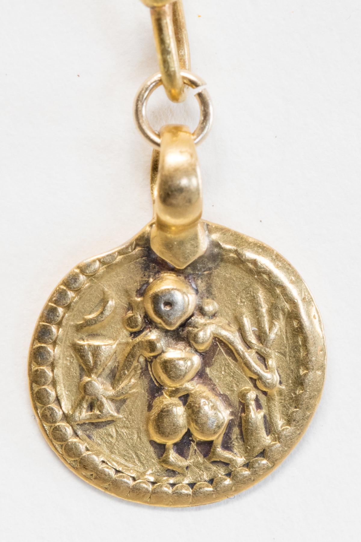 Pair of 22K gold pendants of two Hindu dieties--Hunuman and Durga.  Old pendants converted to earrings with a french wire, for pierced ears.