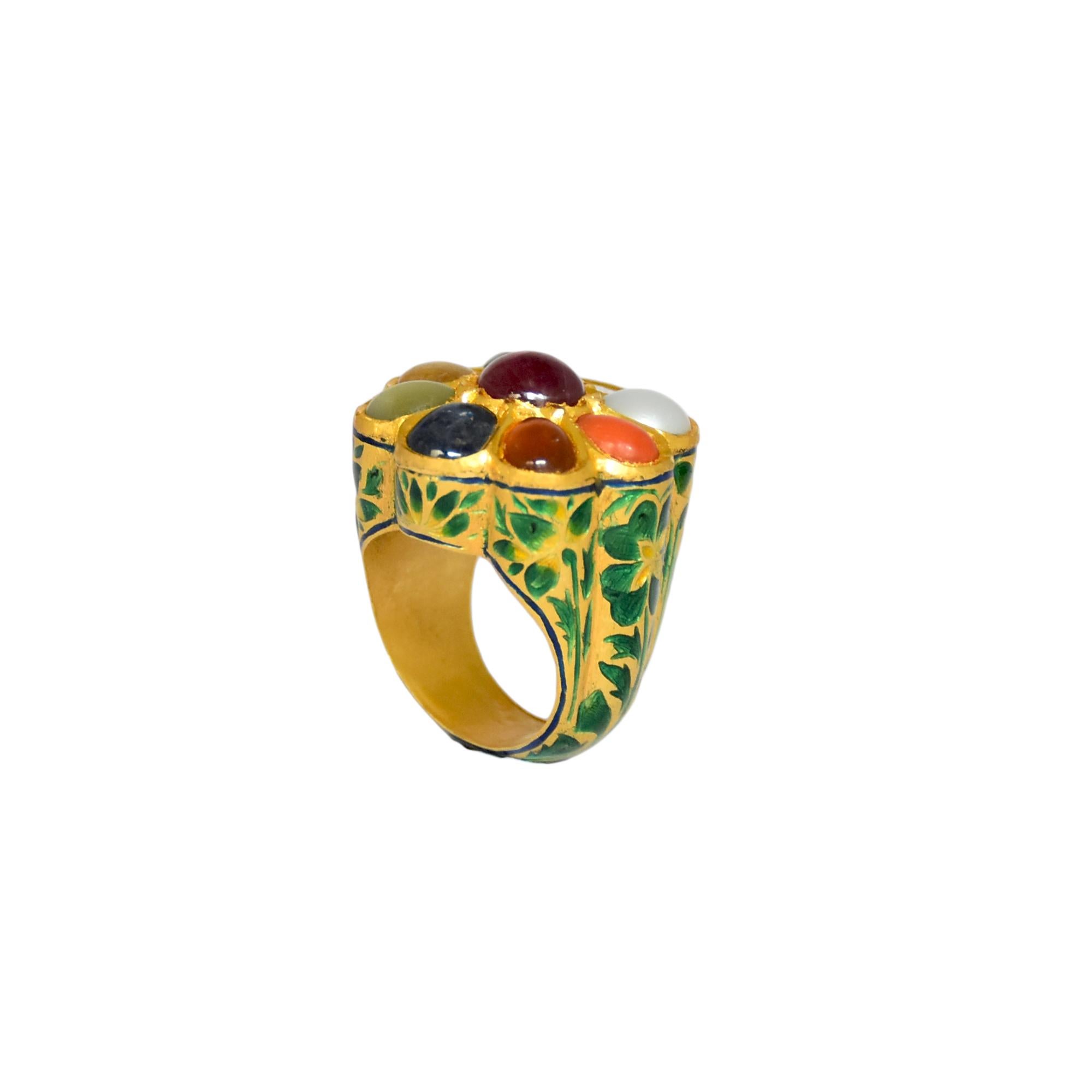 Traditional Mogul style Kundan Meena Navratna gold ring is hand enameled on band with specially selected nine natural gemtones at top. The ring is set with real flat uncut Diamond Polki and nine precious gemstone namely Ruby, diamond, Emerald,