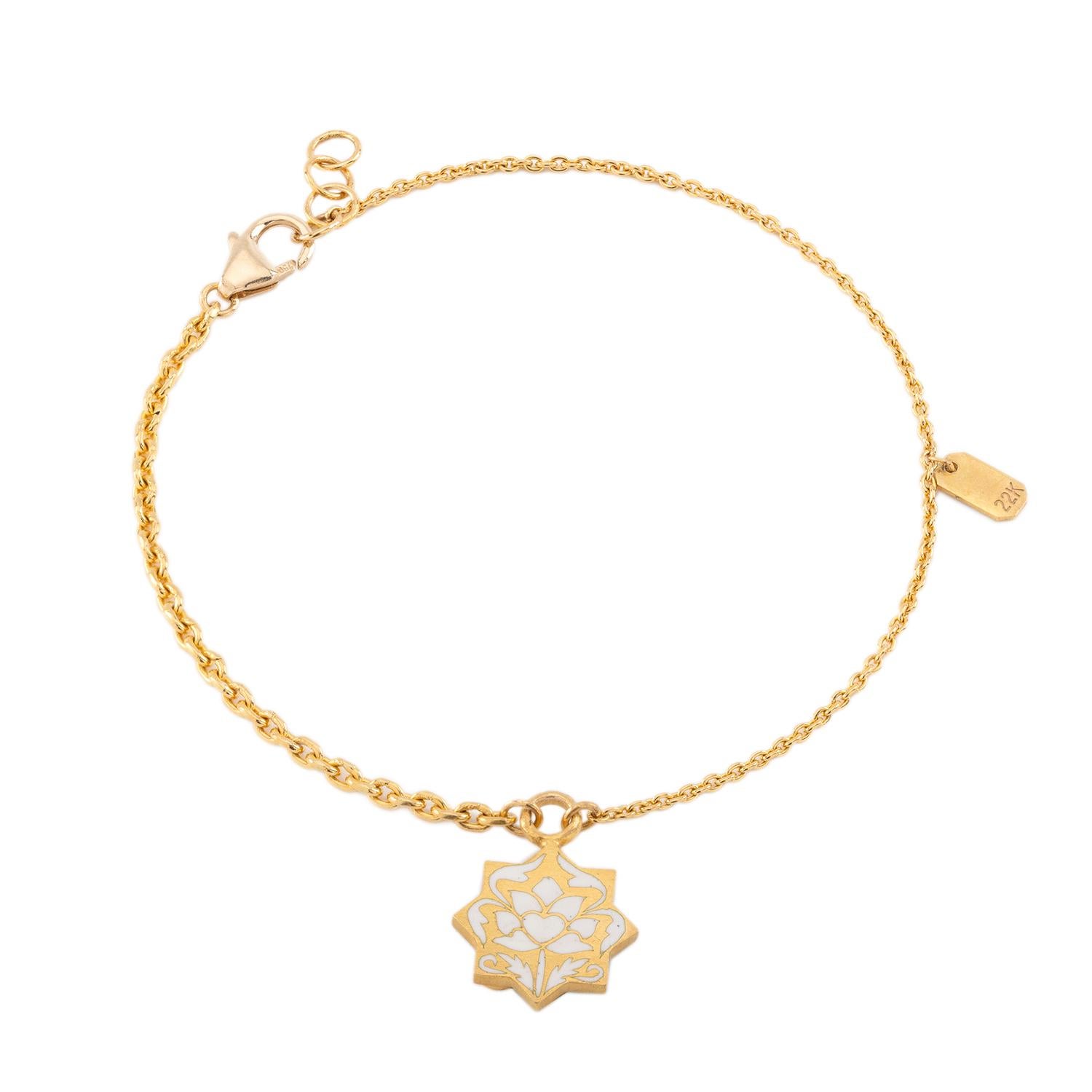 The 'Jasmine Garden' 8-Point Star Reversible Initial Charm Bracelet is not just a piece of jewelry—it is a modern heirloom that encapsulates the power of self-expression, a tangible representation of your individuality, and a precious keepsake to be