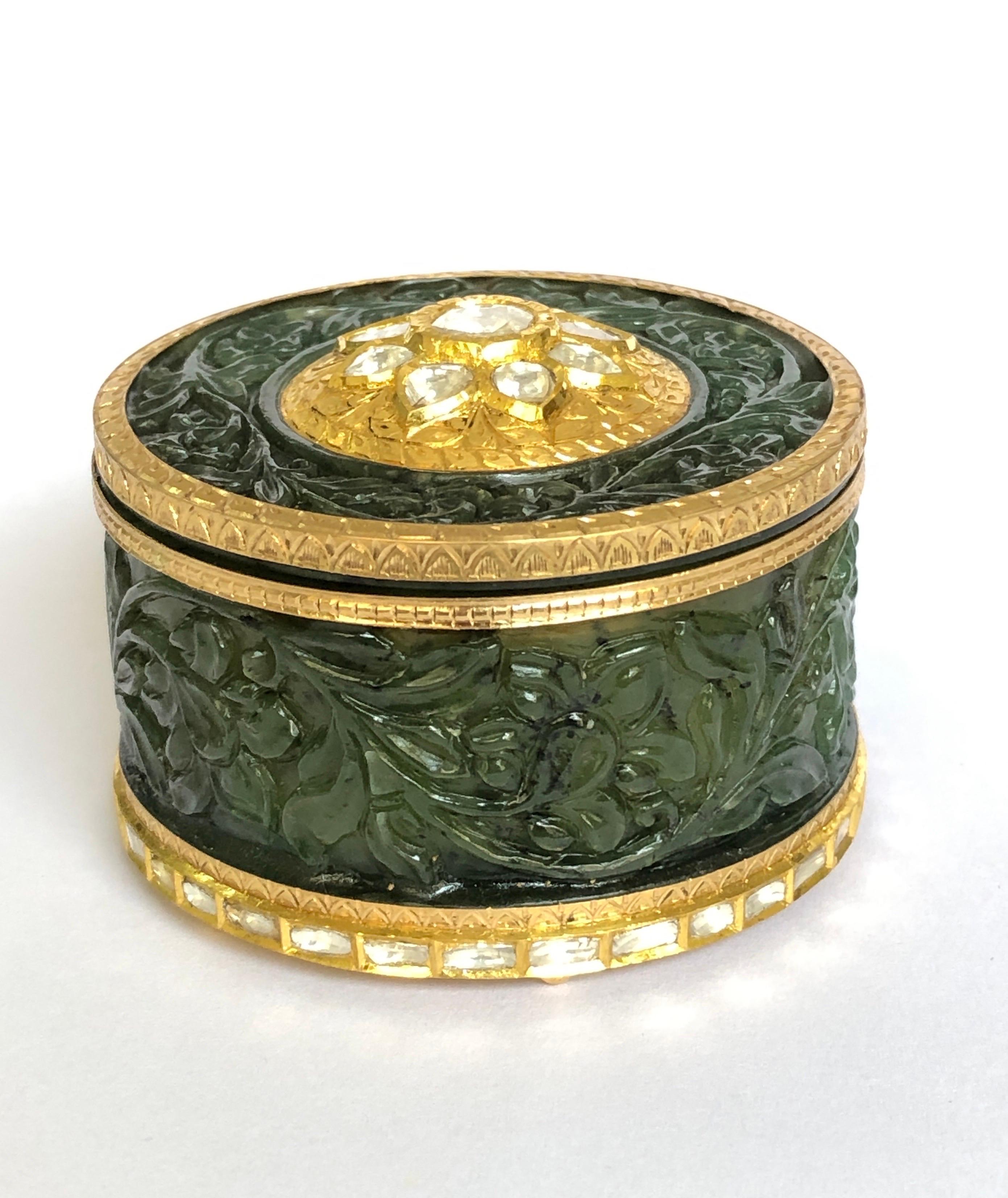 Uncut 22K Gold Jade mughal carving box studded with diamonds