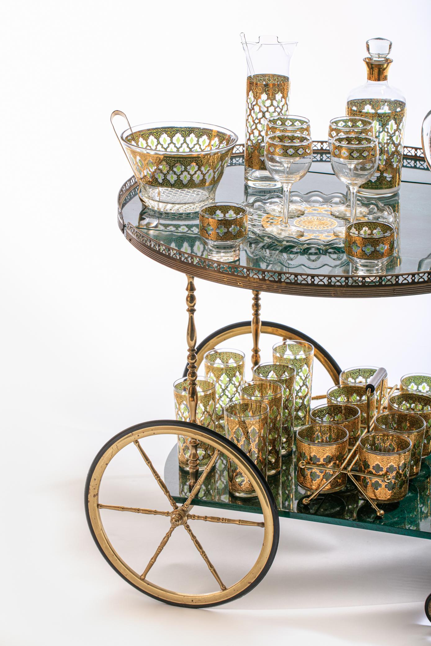 Beautiful set of Moroccan themed cocktail / highball glasses adorned in 22-karat gold. Glasses show no wear and are in great condition. This style was showcased in the feature film 