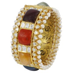 22K gold nine precious gemstone Navratna bangle with diamond polkis
