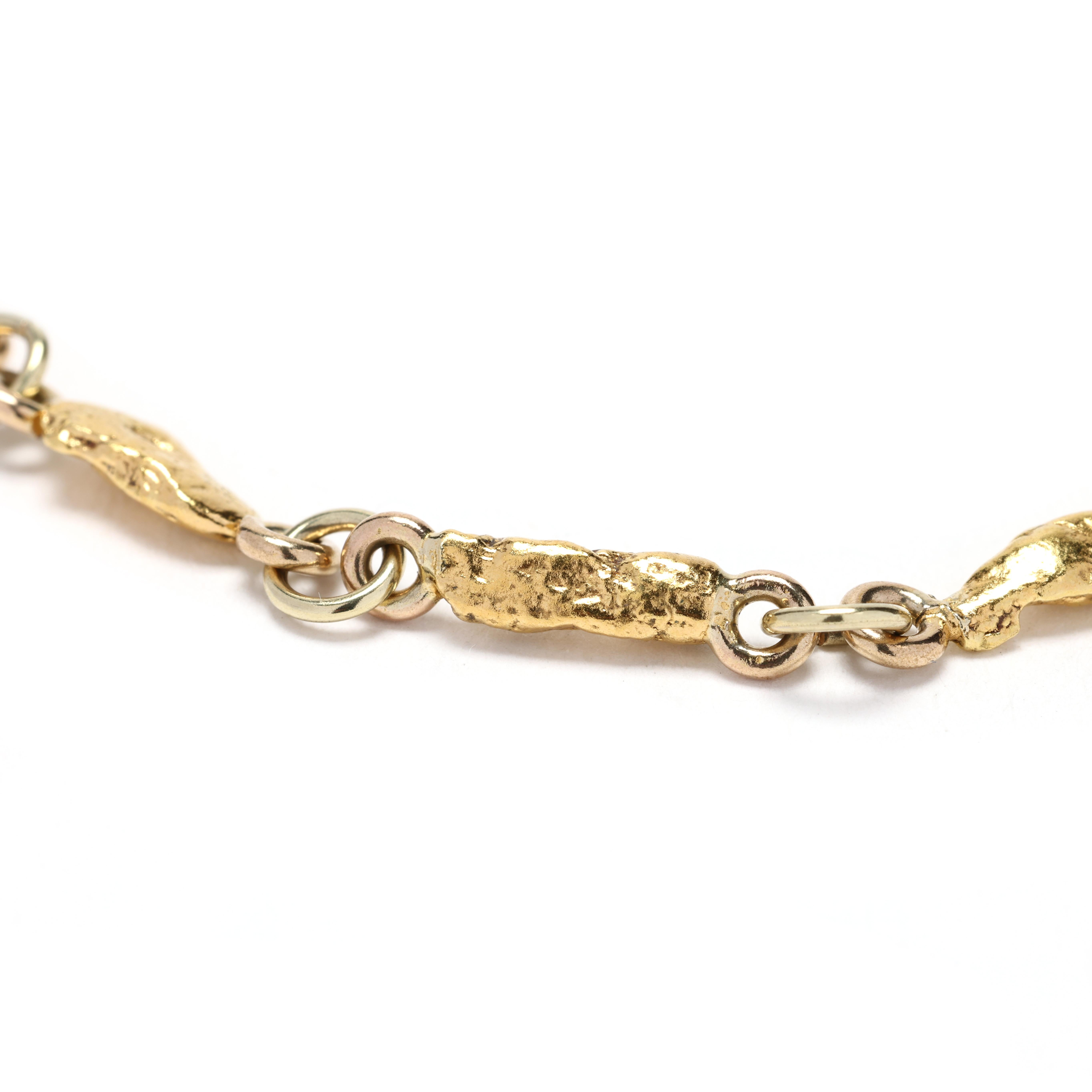 Embrace the allure of luxury with this stunning 22k Gold Nugget Bracelet. Featuring genuine gold nuggets set on an 18k yellow gold chain, this bracelet exudes elegance and sophistication, adding a touch of opulence to any ensemble. Perfect for