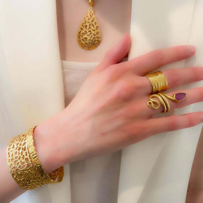 Make a statement with this 20k gold organic finish cuff which is intricately hand carved, hand made and one of a kind. Part of the Essentials Collection which is the ultimate in ease and beauty. Effortlessly transitions from day to night. These are