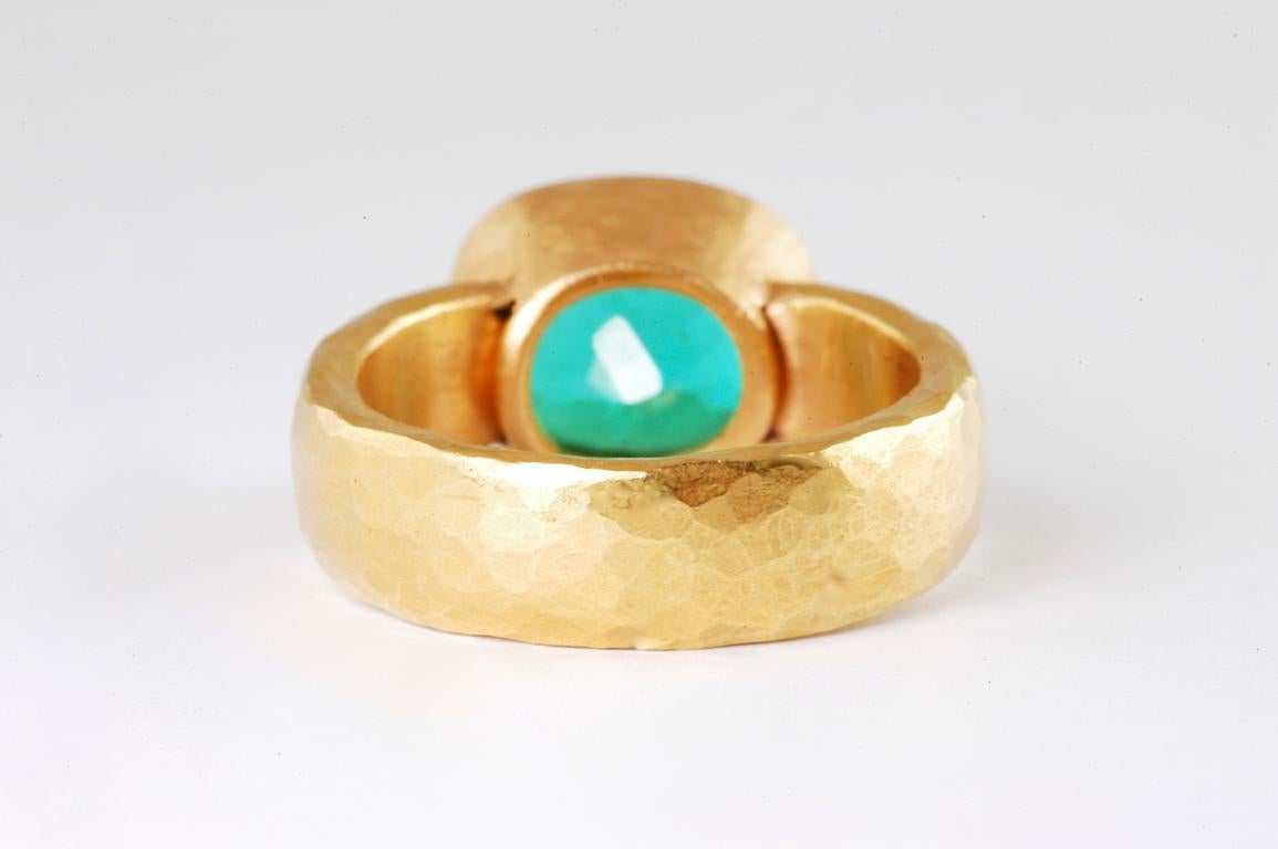  22k gold ring with cushion shaped emerald 4.17cts handmade in Notting Hill London by British jewellery designer Malcolm Betts. 7mm wide, heavy hammered 22K gold set with this stunning large cushion cut Colombian Emerald, the colour is bright yet