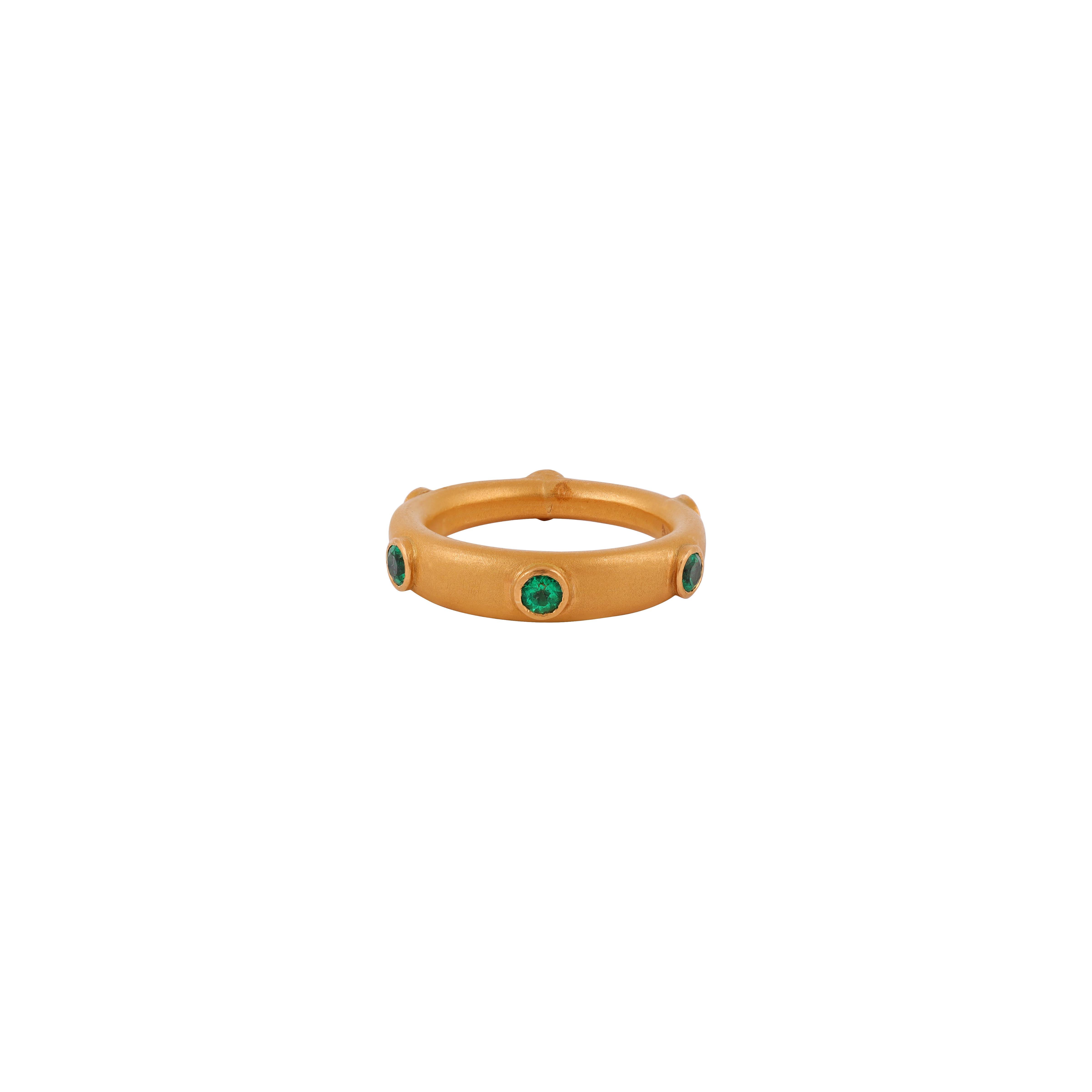 22k Karat Yellow Gold 0.64 Carat Ground-Cut Natural Emerald Eternity Band Ring
Emerald - 0.64 
22K Gold - 3.97

This glorious emerald band is sensational. The solitaire horizontally placed Round shape emeralds in gold setting is timeless. The