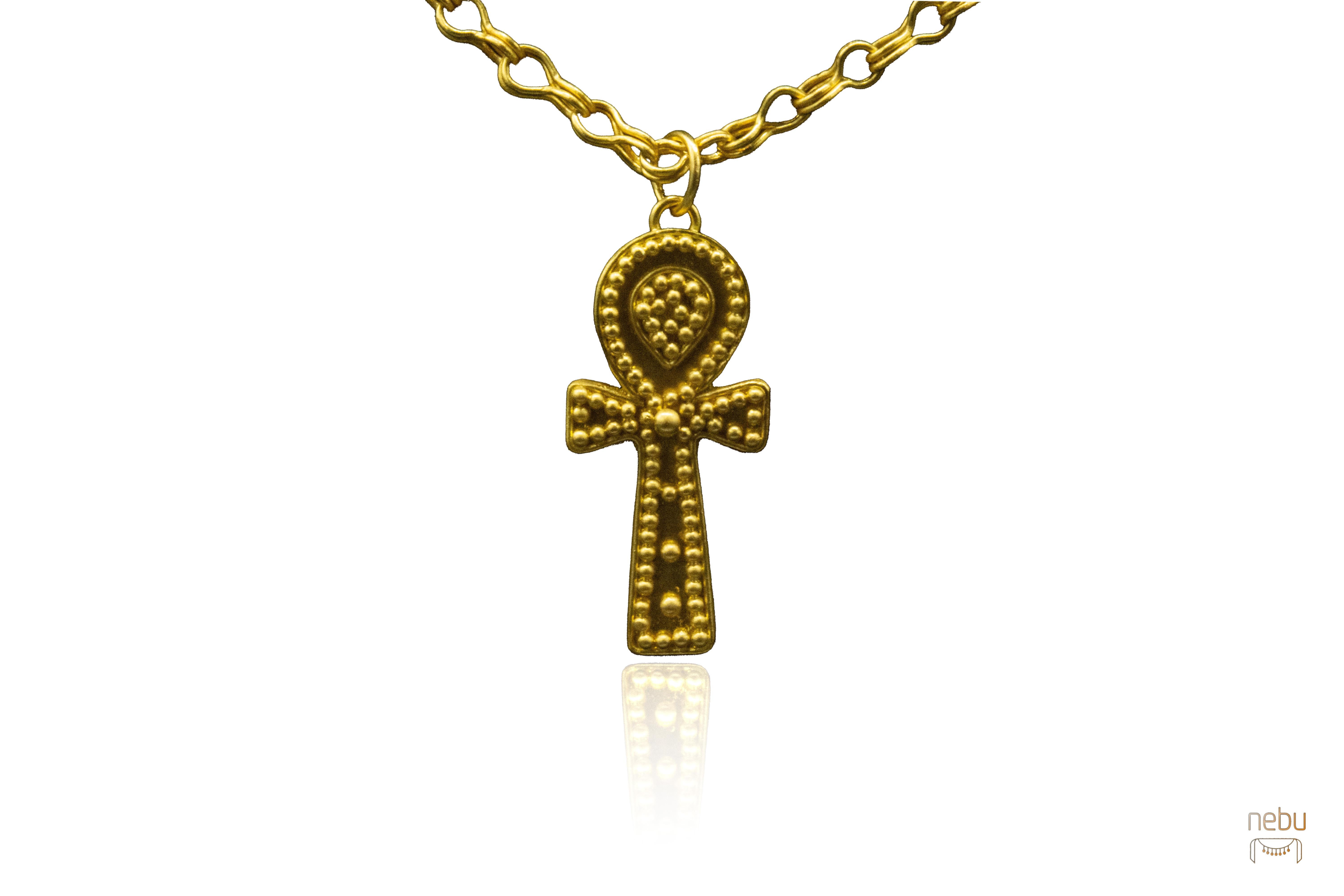 -Uno disponibile.
-Unico nel suo genere. 
-Oro 22K.
-Realizzato a mano.
-Con il logo Nebu impresso a fuoco.
-Venduto solo come ciondolo.

Scopri il fascino profondo dell'Ankh, o chiave della vita, un simbolo di eternità venerato nell'antico Egitto,