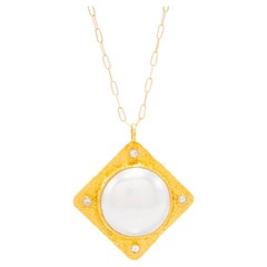 Collier pendentif en perles et diamants 22 carats de Tagili