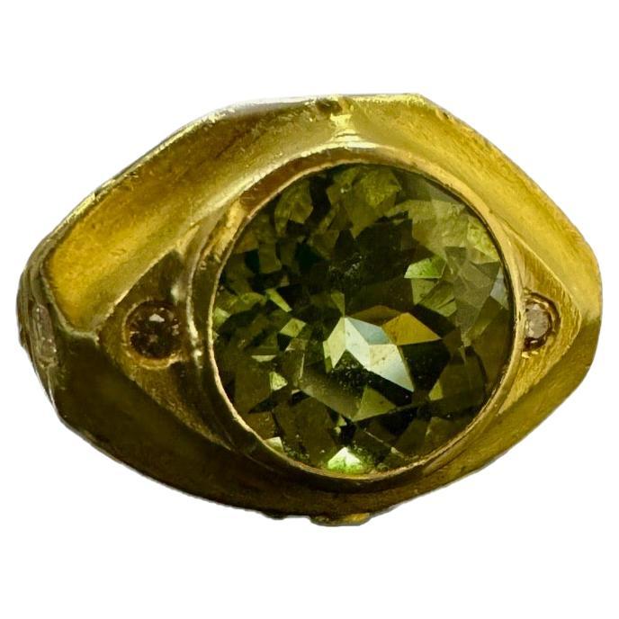DeKara Designs Designer Collection

Metal- 22K Yellow Gold, 20 Grams.

Stones- 5.50 Carat Mint Tourmaline, 3 Emerald Cut Diamonds, Four Round White Diamonds, 2 Yellow Diamonds, G Color VS1-VS2 Clarity, Approximately 1 Carat.  

Size- 6 1/2. 