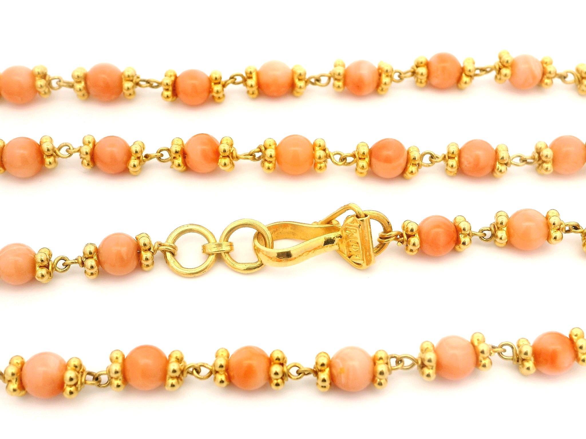 --Stone(s):--
Numerous Natural Genuine Corals - Bead Shape - Natural Variation in Color - Range from 4mm to 4.2mm (approx.)

Material: Solid 22 Yellow Gold
Weight: 18.28 Grams
Chain Type: Bead Chain Necklace
Clasp: Hook Clasp w/ Safety Fold Over