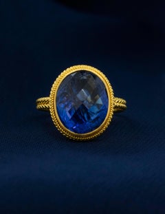22K Yellow Gold Byzantine Ring with a 7.60 carat Tanzanite