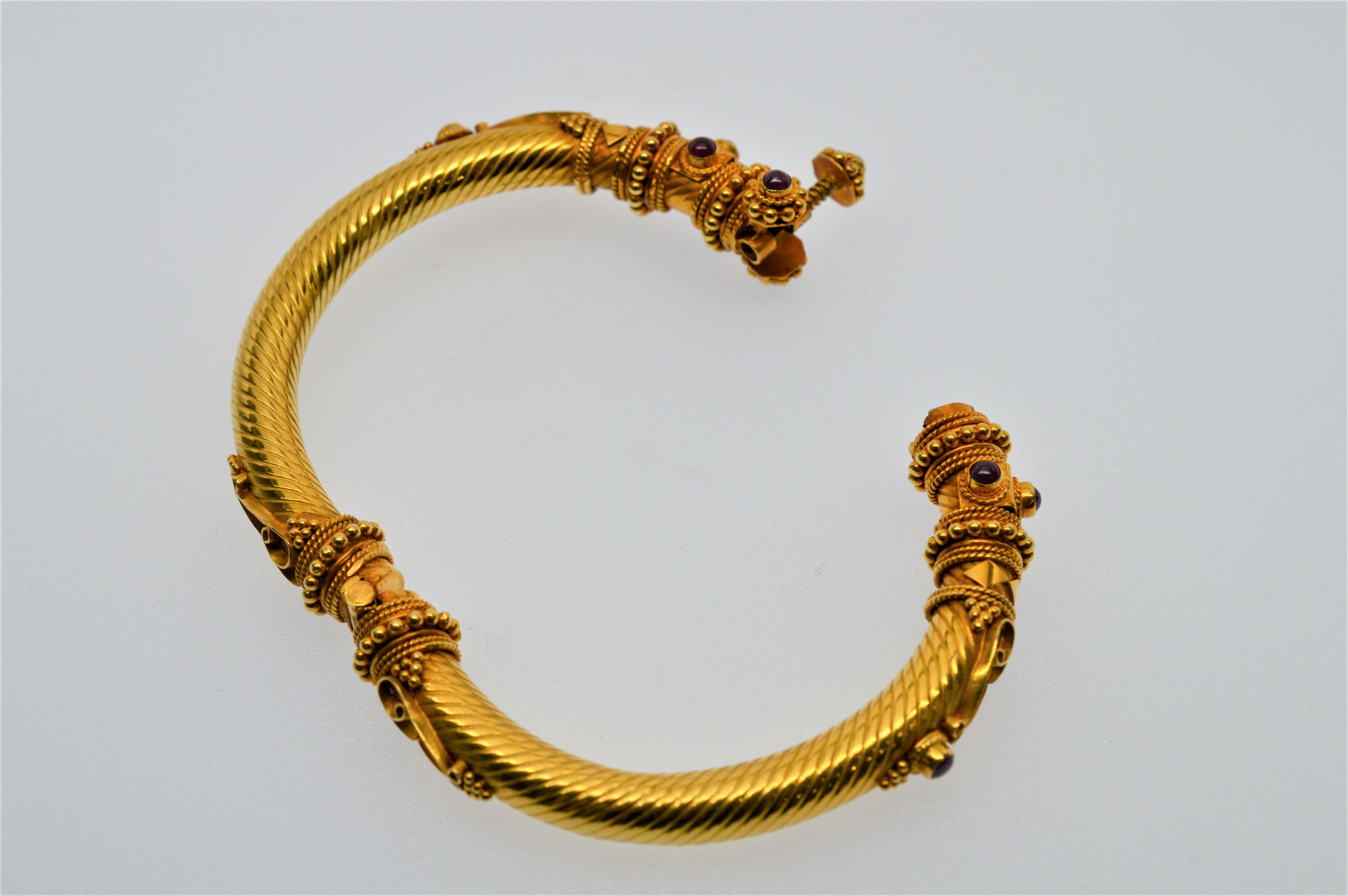 Women's Ruby Cabochon 18 Karat Yellow Gold Bangle Bracelet For Sale