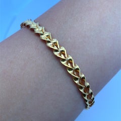 Bracelet en or jaune (22k) avec torsades entrelacées