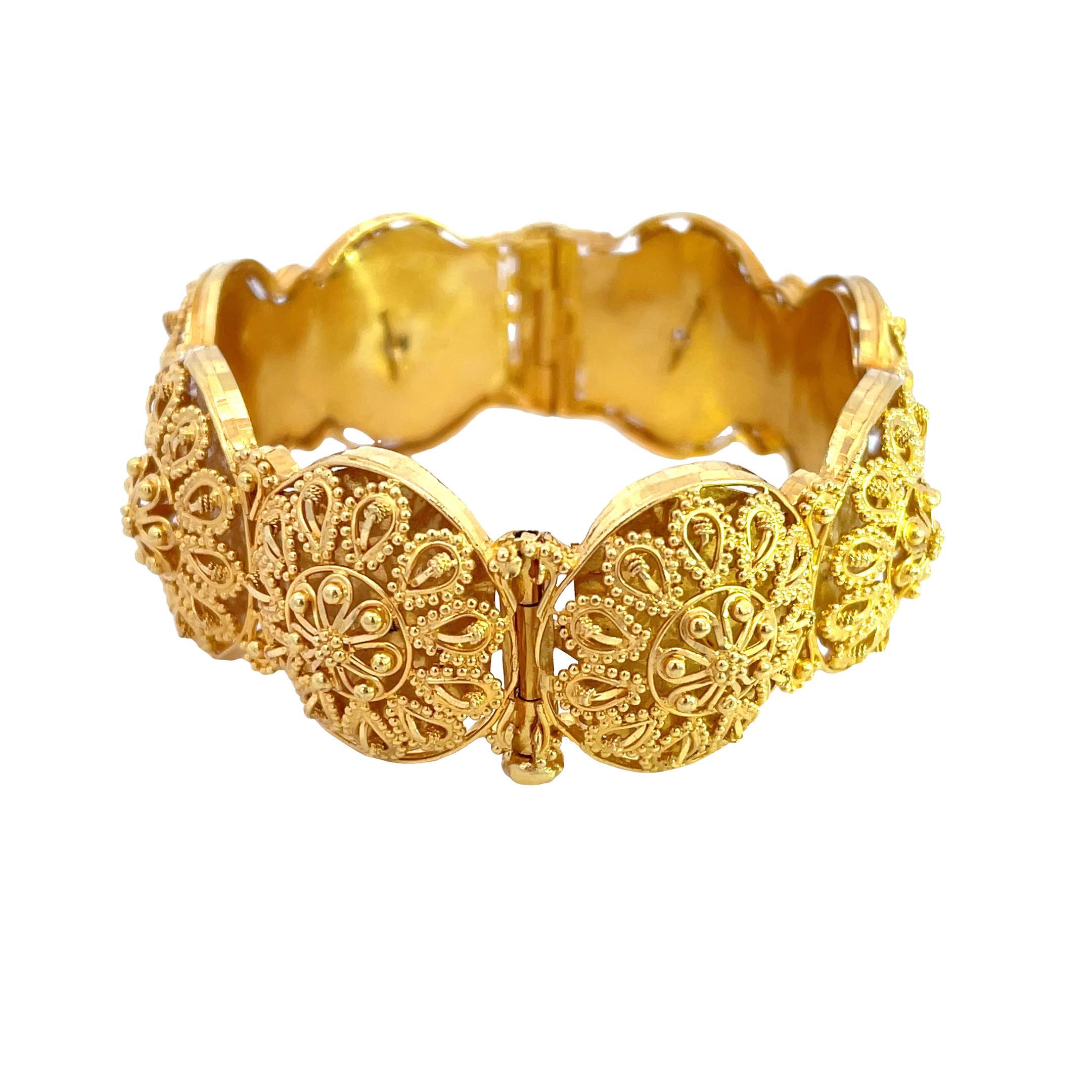 Introducing our exquisite 22K Yellow Gold 63.50 gram Cuff Bangle, a dazzling addition to your jewelry collection. An Impressive piece of jewelry will definitely make a statement. Made from lustrous 22K yellow gold, the Bangle showcase a radiant and
