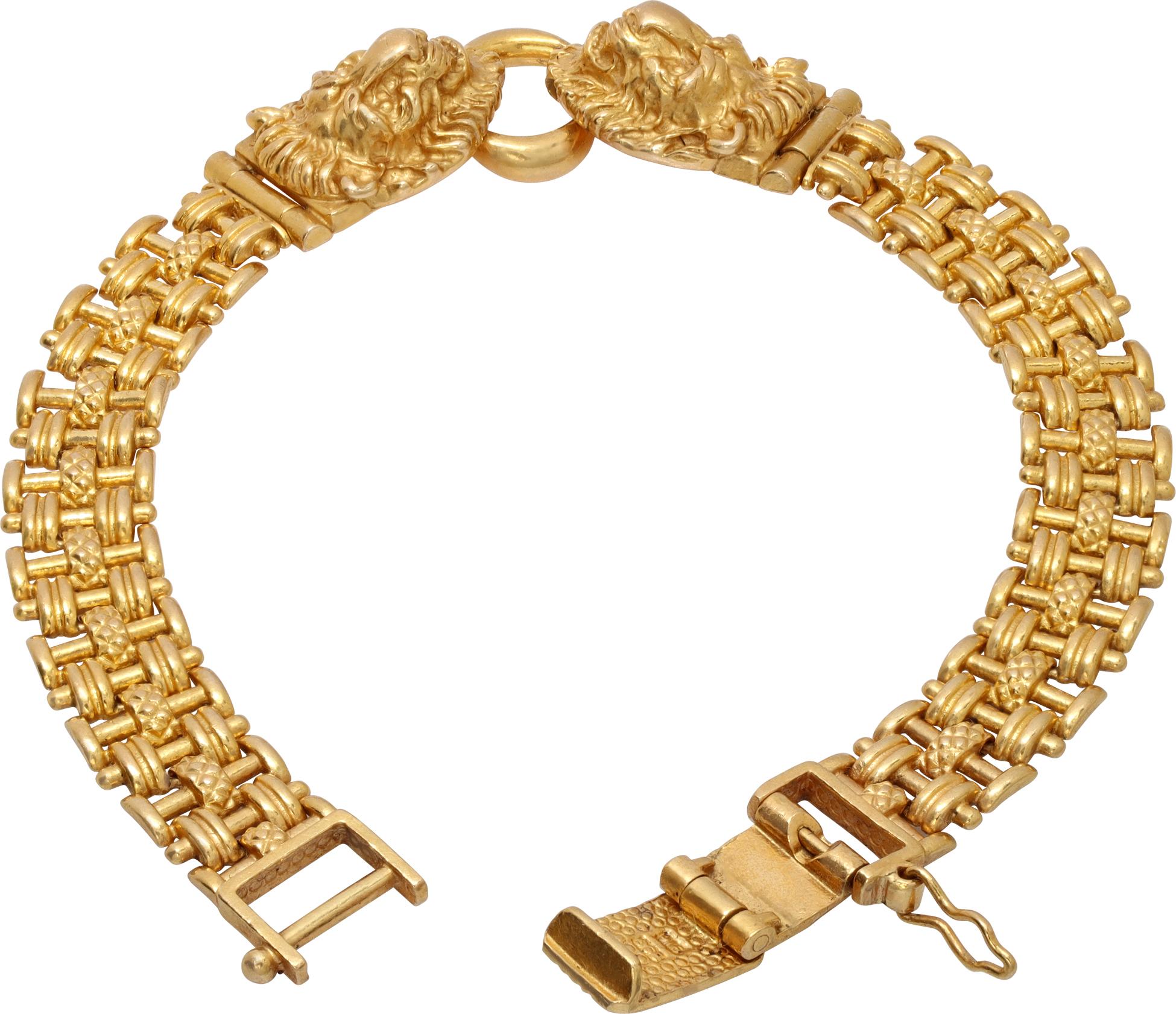 Double lion head bracelet in 22k yellow gold with woven chain link bracelet. 7.25 inch length x 14mm width.
