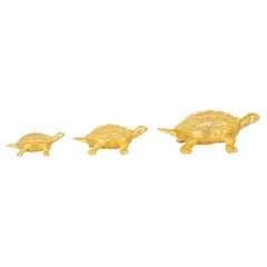 Family de trois tortues en or jaune 22 carats texturées
