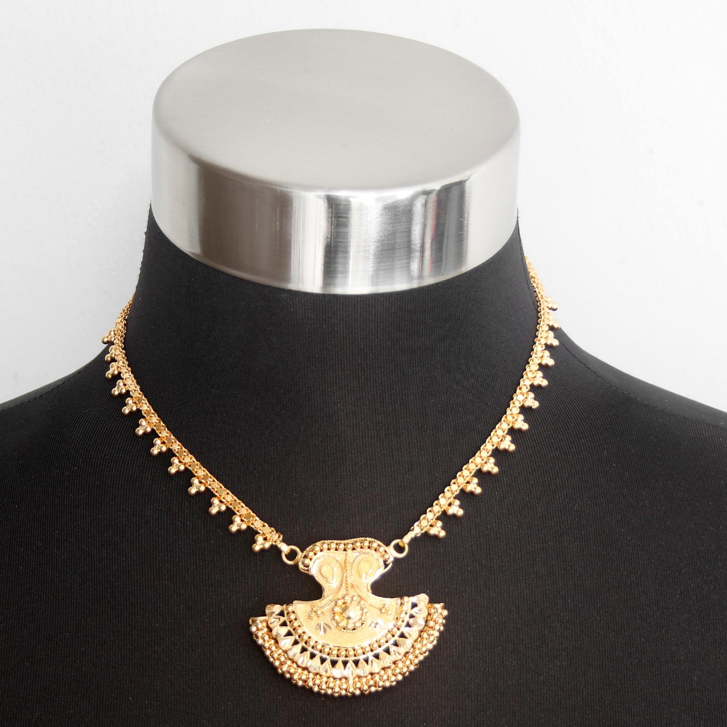 22K Yellow Gold Indian Design Necklace - Beautiful Indian design necklace. 13 inches in length. Total weight 29.5 grams. It is a unique design that can be worn to a wedding or as an every day necklace
