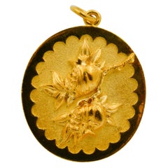 22 Karat Yellow Gold Oval Peach Blossom and Chinese Longevity Symbol Pendant