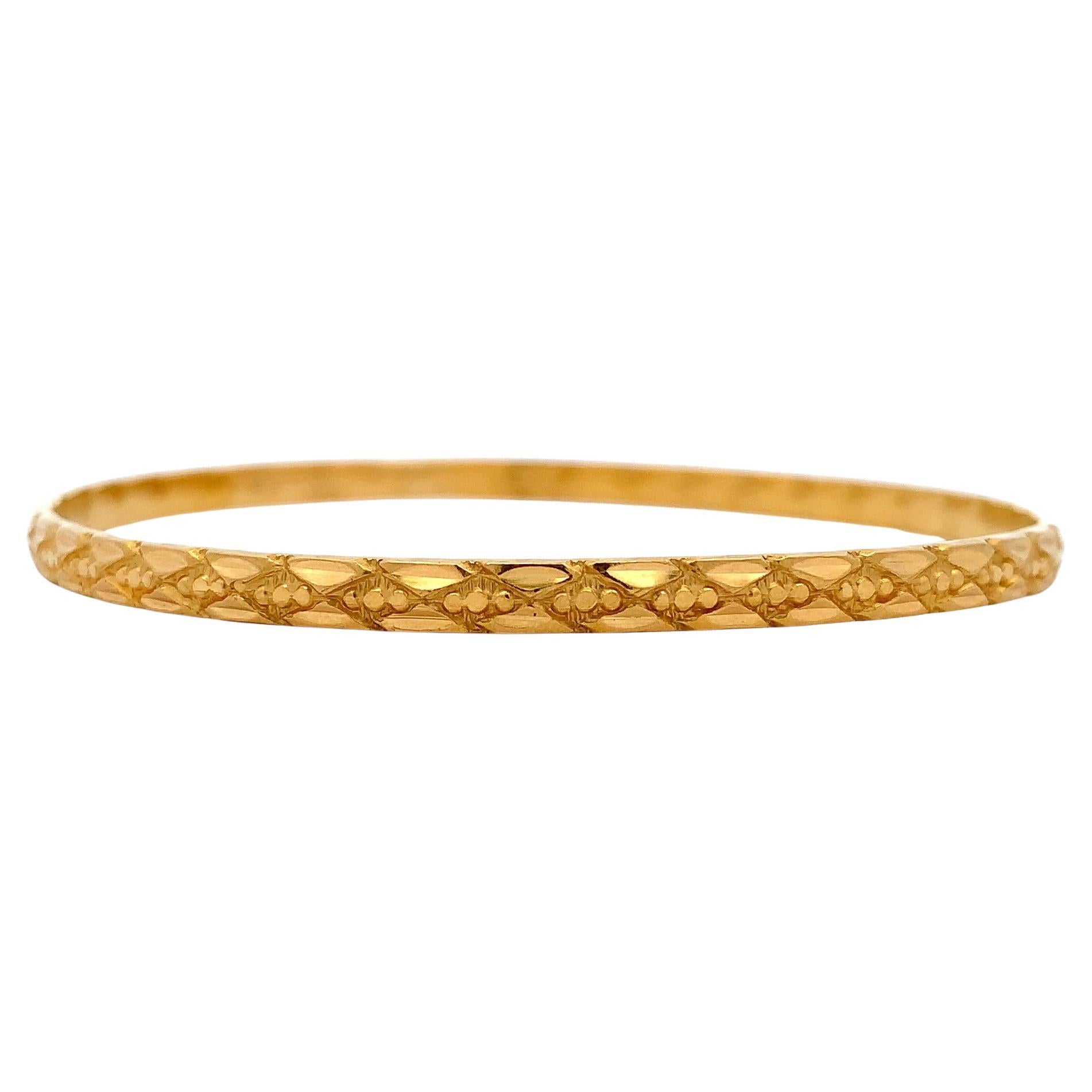 22k Yellow gold patterned bangle bracelets