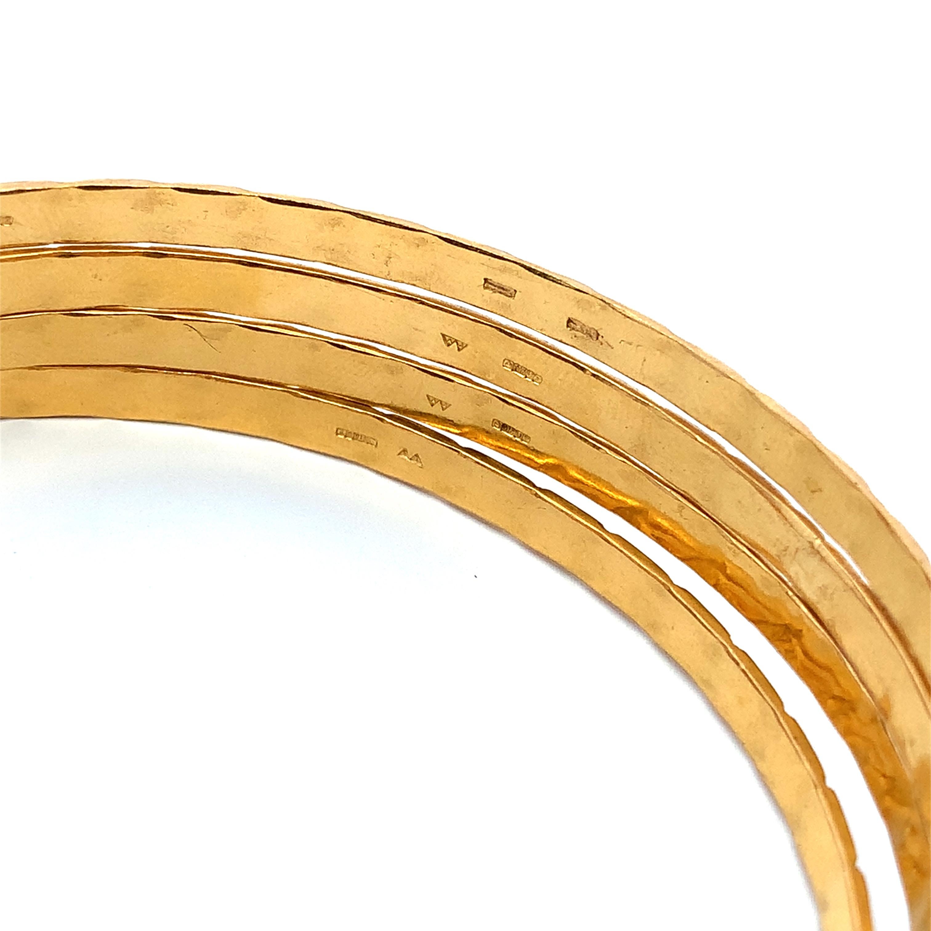 Women's or Men's 22k Yellow gold patterned matching bangle bracelets For Sale