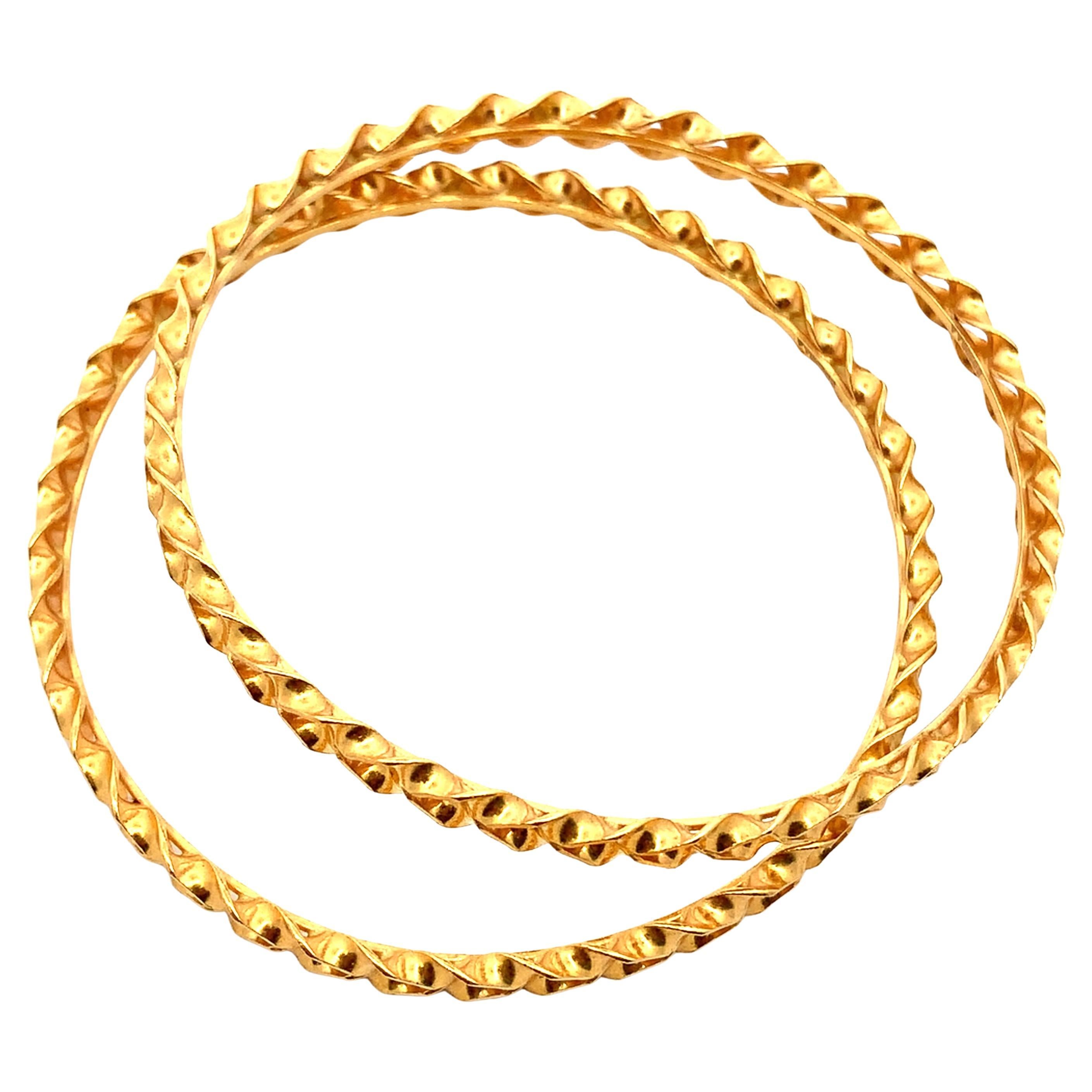 22k yellow gold twisted double matching bangle bracelet For Sale