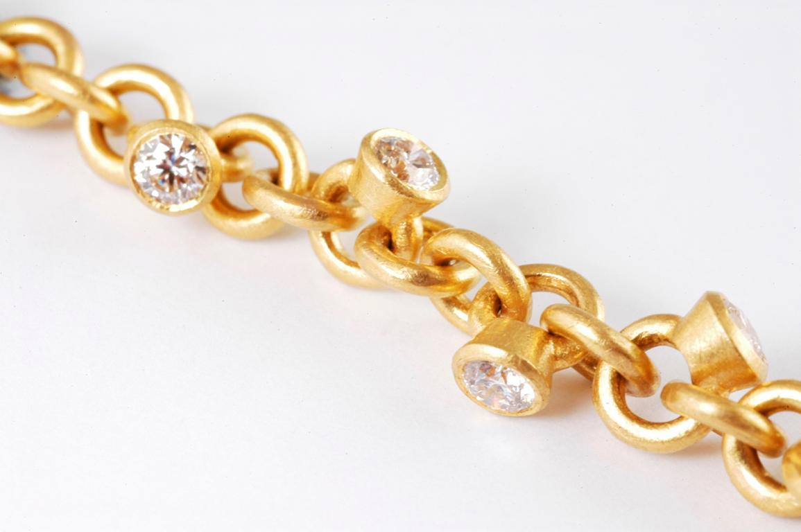 Contemporary 22 Karat Gold Handmade Link Bracelet with Brilliant Cut Diamond Charms For Sale