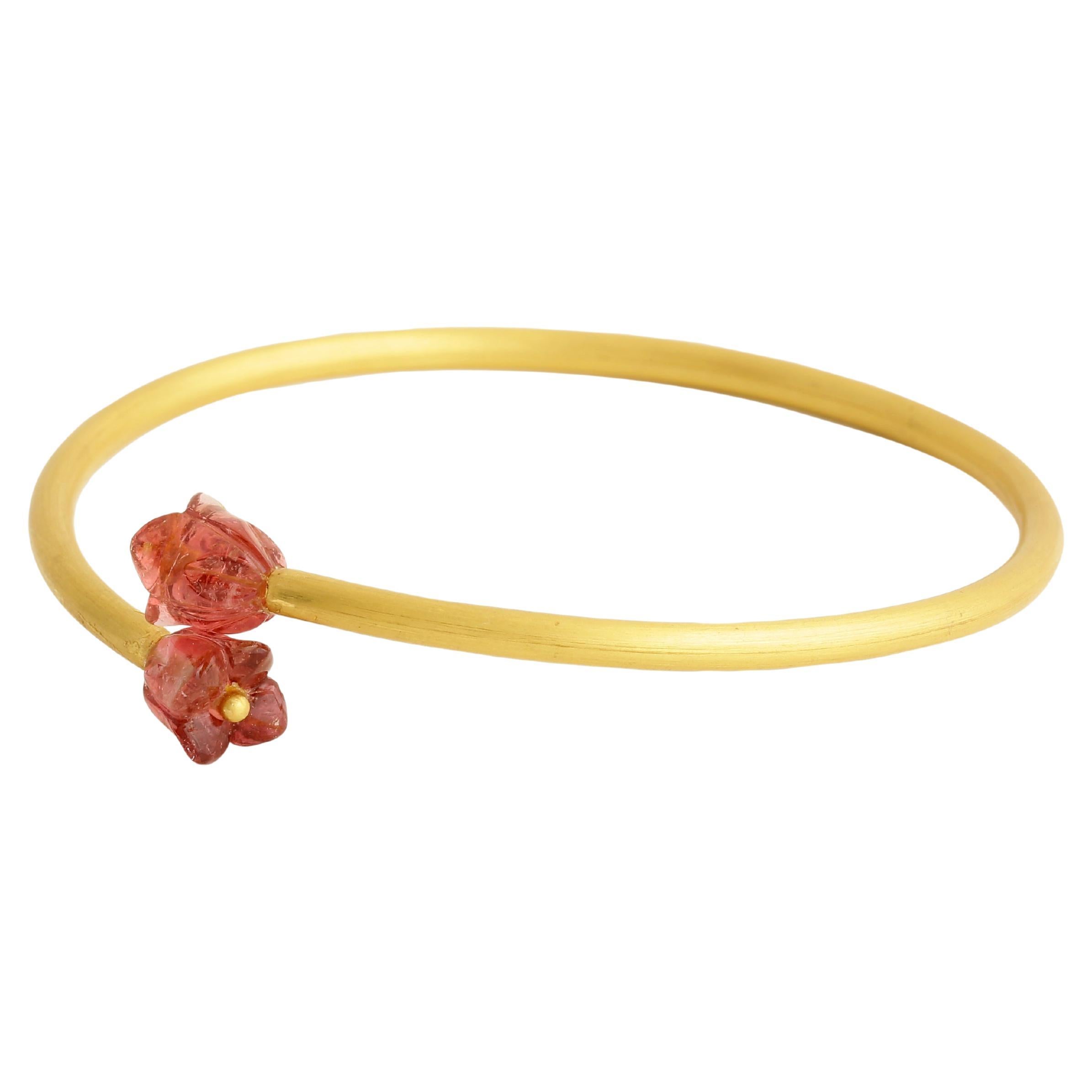 22Karat Gold handcrafted flexible bangle with a pair of tourmaline Flower For Sale