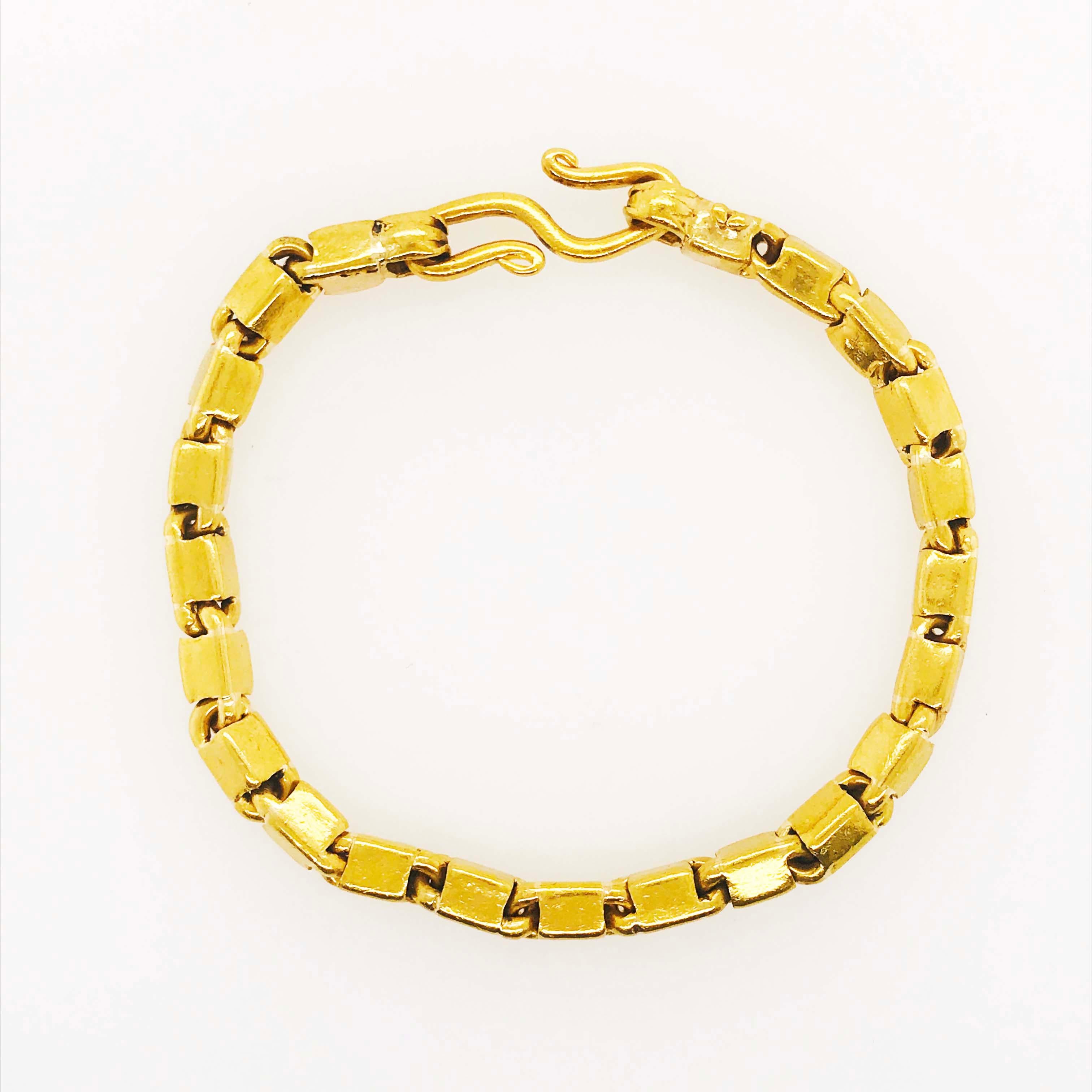 The 22 karat solid gold Baht bracelet is the perfect chain link to wear every day!  The gold is heavy and it speaks of strength and endurance.  The length of the bracelet is 8 inches but it could be shortened by removing the links.  The rich 22