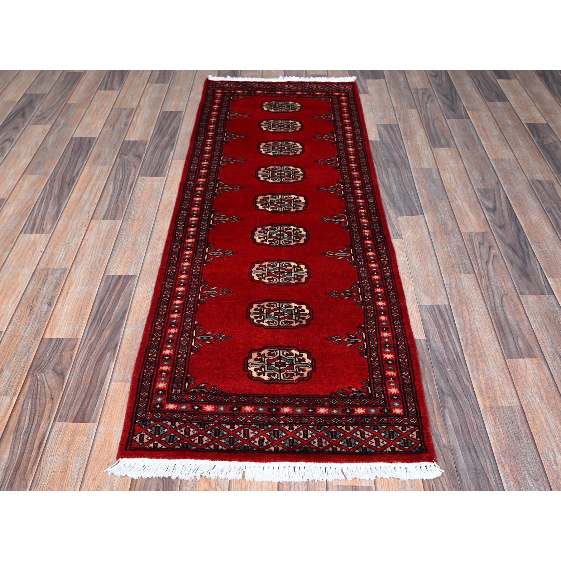 Crimson Red, Princess Bokara with Tribal Medallions, Natural Dyes, Soft Wool, Hand Knotted, Narrow Runner, Oriental Rug
Primary materials: Wool
Latex: No Pile 
height: 0.25 Inches
Style: Traditional
Primary color: Red
Secondary colors: Gray, Beige,