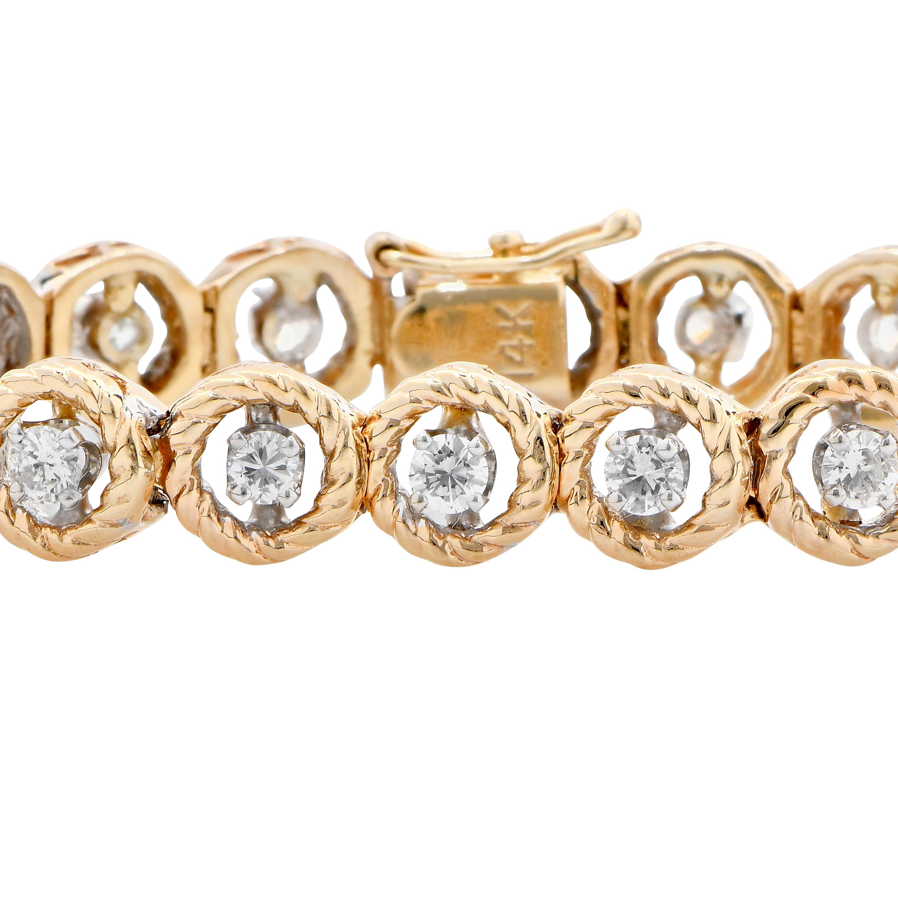 Hand crafted rope rondelle motif diamond bracelet featuring 23 round brilliant cut diamonds with an estimated total weight of 2.3 carats set in 14 Karat Yellow and White Gold.
Bracelet Length: 6.75 inches
Metal Type: 14 Karat Yellow and White