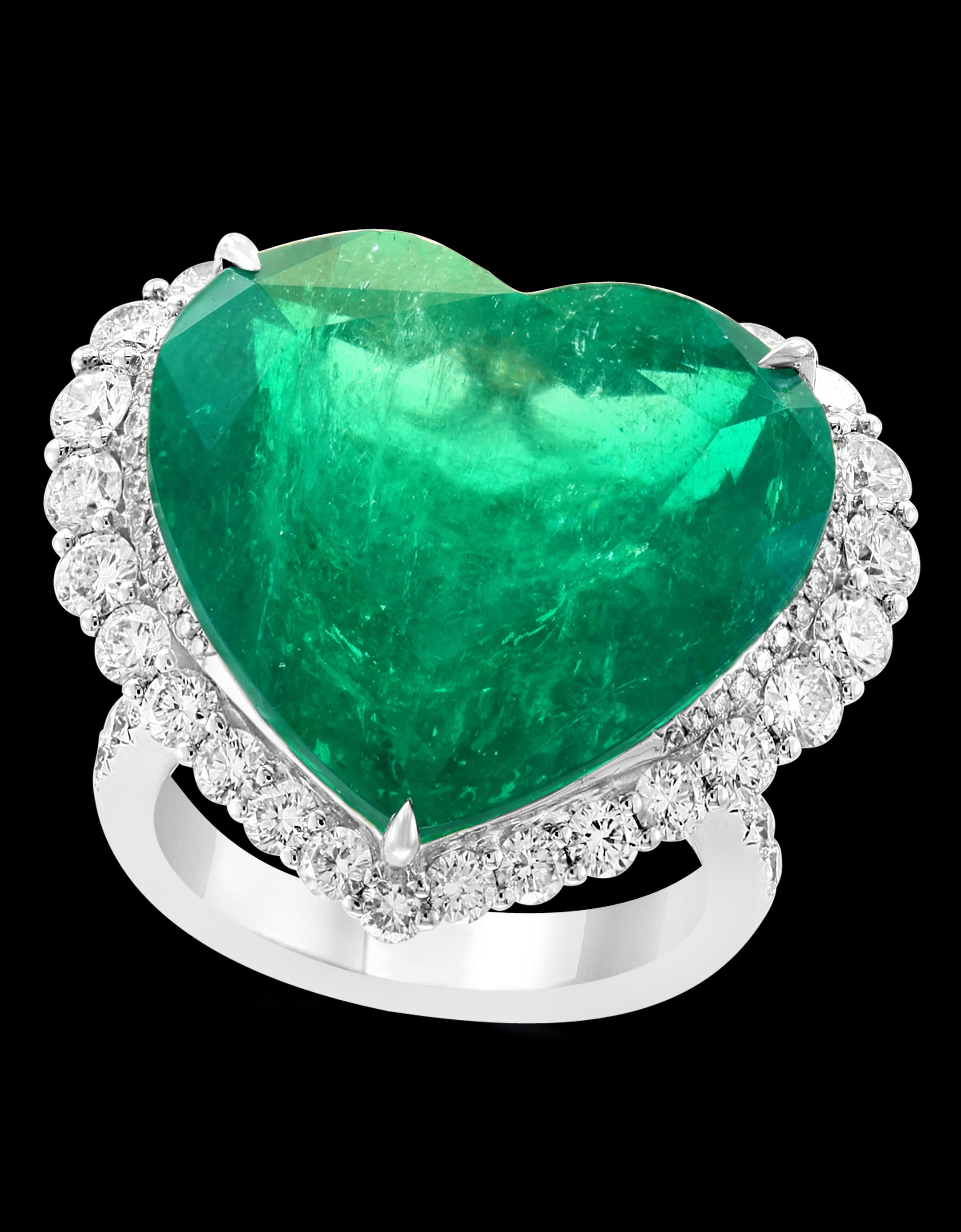 AGL Certified Minor 23+ Ct Heart Shape  Colombian Emerald & Diamond 18 Kt Ring 
23.08  Carat Heart Shape Colombian Emerald And Diamond 18 Karat Gold  Ring Estate classic, cocktail ring . One of the rare piece as the emerald is very large and  very