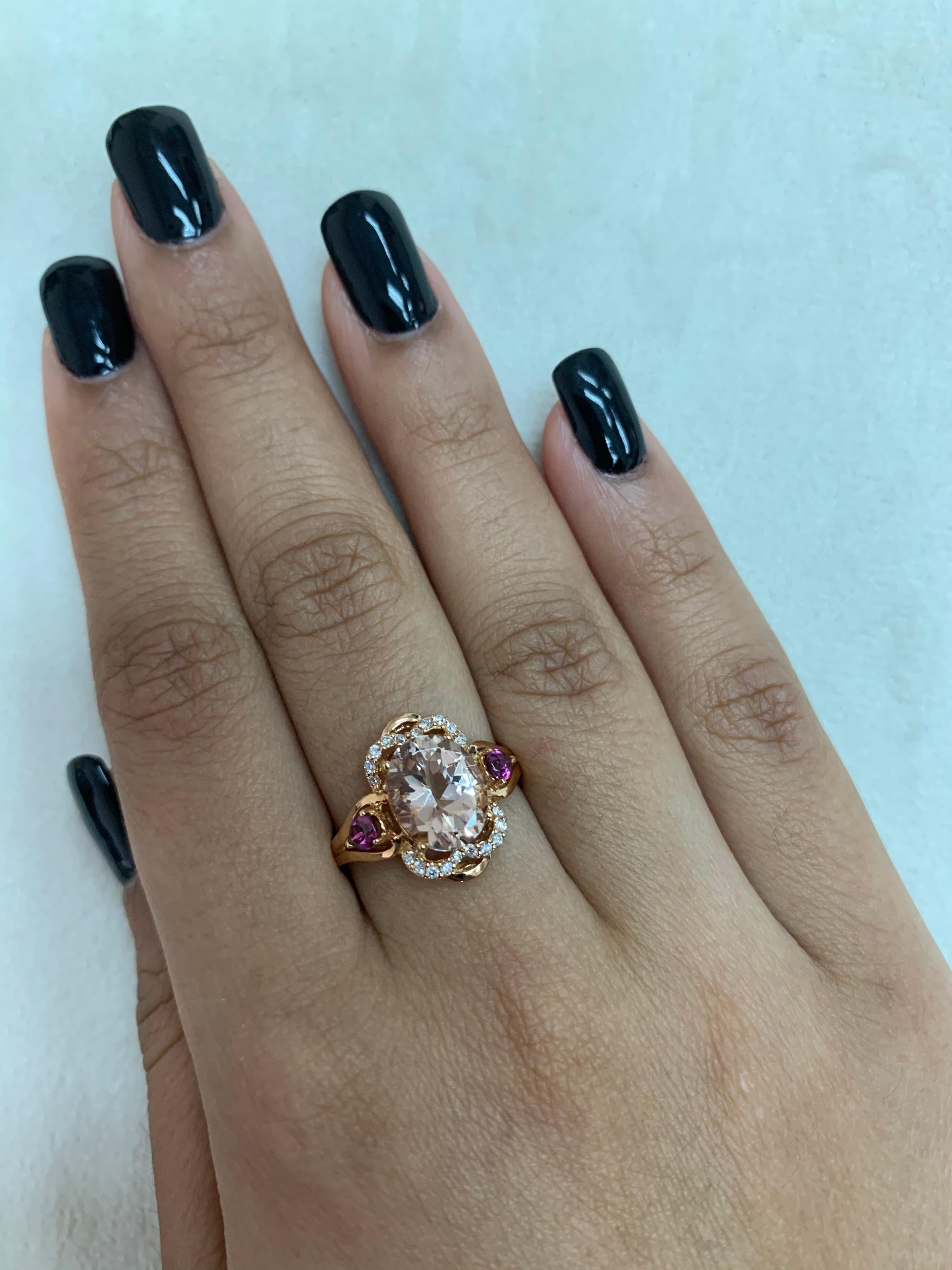 This collection features an array of magnificent morganites! Accented with diamonds these rings are made in rose gold and present a classic yet elegant look. 

Classic morganite ring in 18K rose gold with diamonds. 

Morganite: 2.35 carat oval