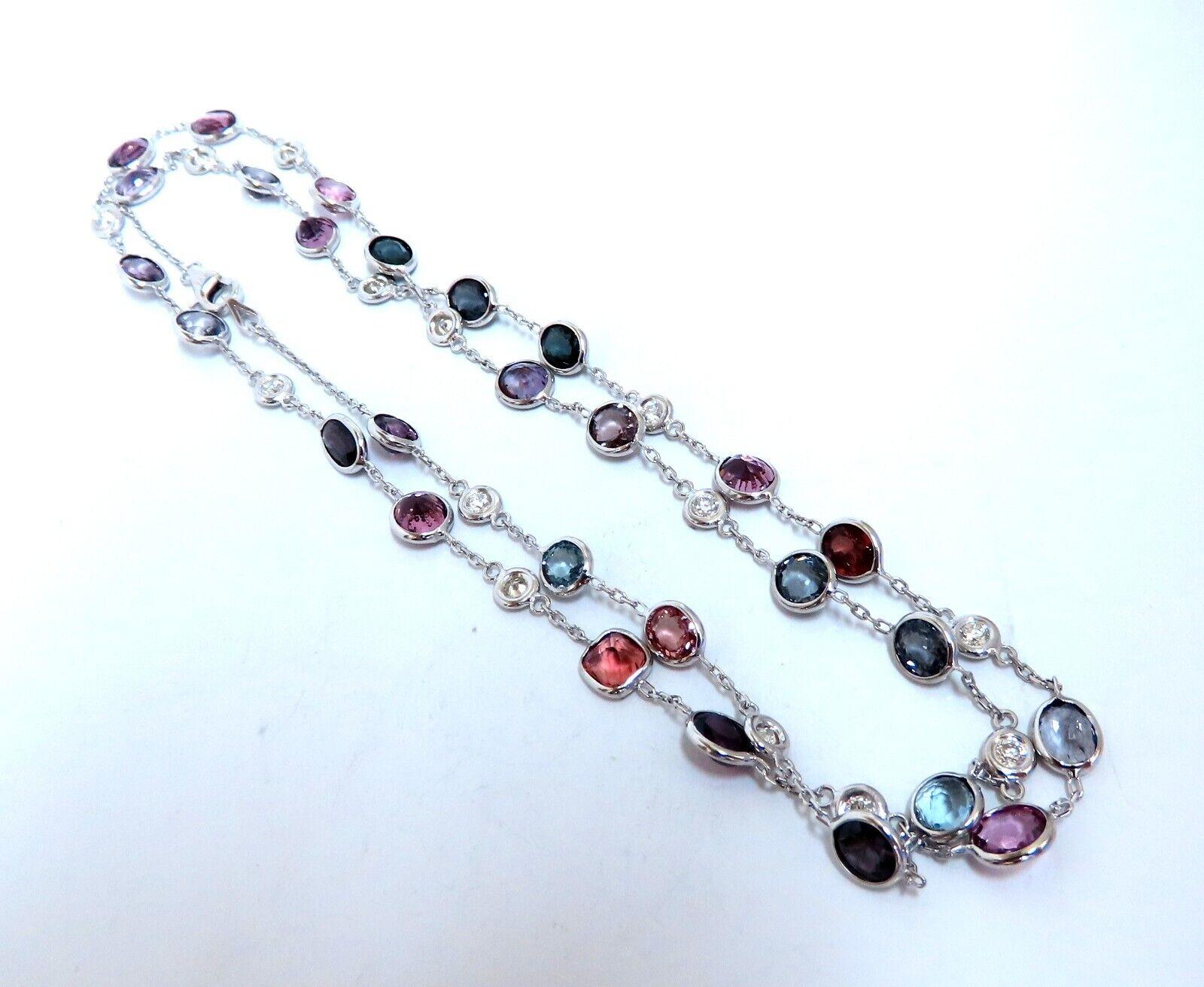 Natural spinel diamonds yard necklace.

Ranging colors: pink, greens, red, purple, blue, and teal.

Ovals, rounds, and cushion cuts.

Average each 5x4 mm

Clean Clarity brilliant cuts

1.05 carat natural round diamonds

H color vs2 clarity

14 karat
