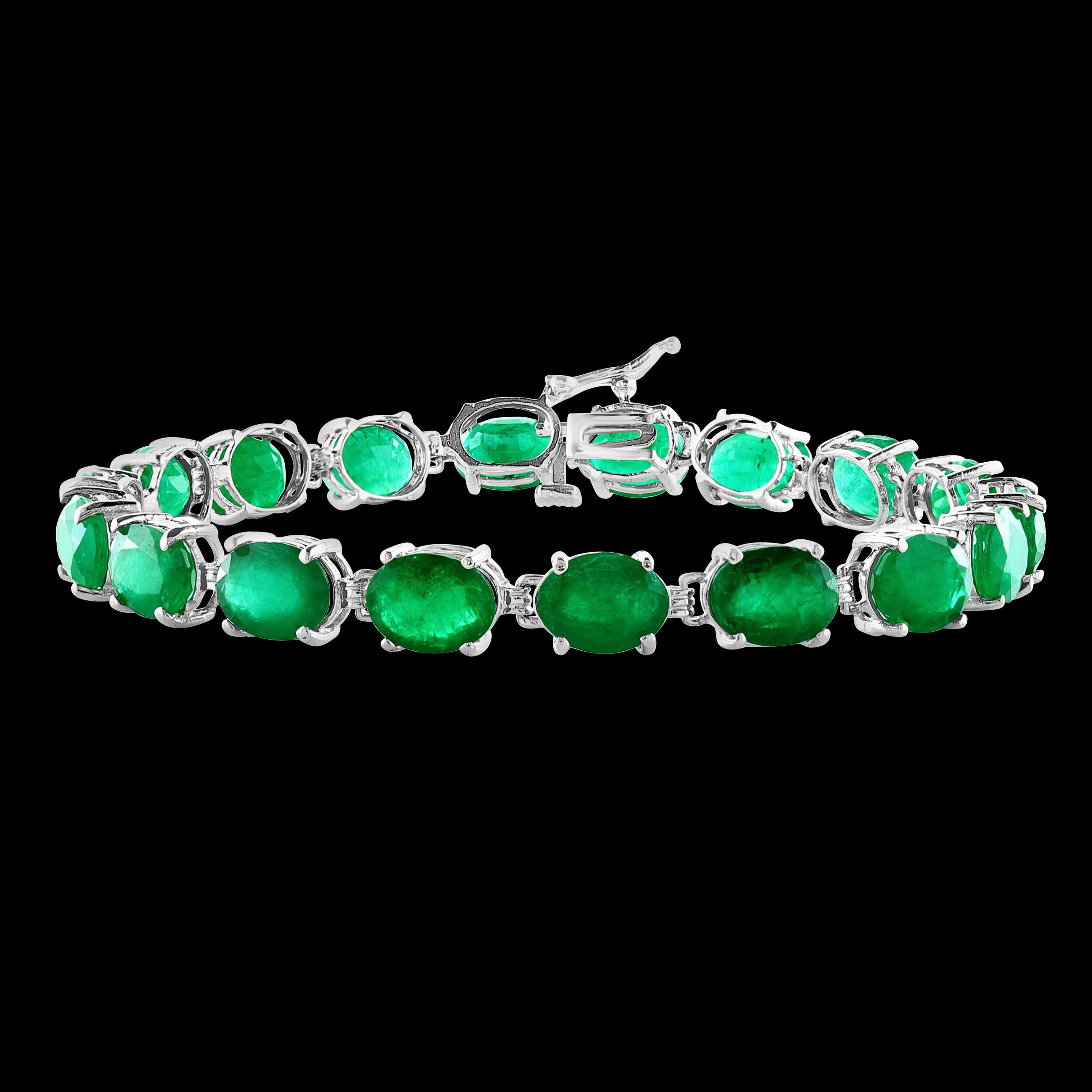  This exceptionally affordable Tennis  bracelet has  18 stones of oval  Emeralds  .  Total weight of the Emeralds is  approximately 23 carat. 
The bracelet is expertly crafted with 10.5  grams of  14 karat White  gold . Have a safety clasp