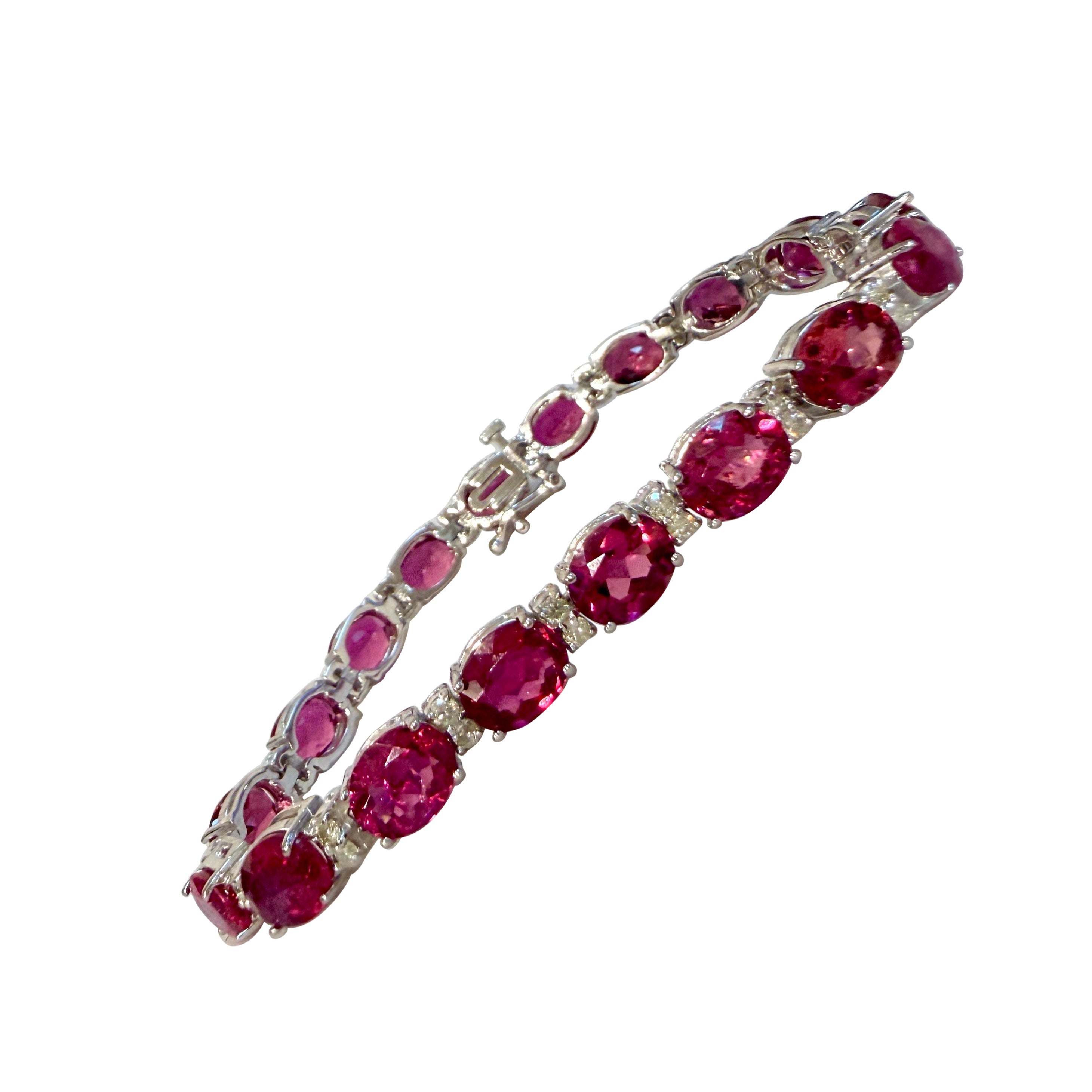 23 Carat Natural Pink Tourmaline
1.6 Ct Diamond Tennis Bracelet 14 Karat Gold