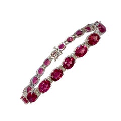 23 Carat Natural Pink Tourmaline
1.6 Ct Diamond Tennis Bracelet 14 Karat Gold