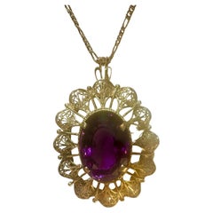 Chaîne collier pendentif vintage en or jaune 18 carats avec améthyste ovale de 23 carats