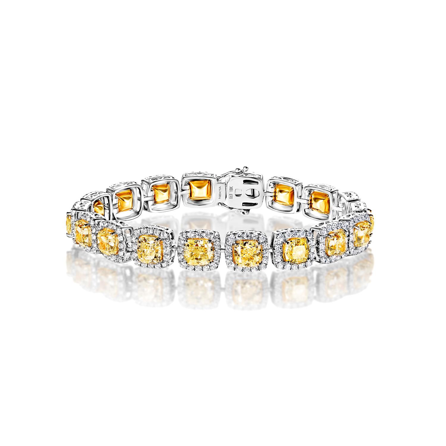 The CHARLEY 22.56 Carat Single Row Diamond Tennis Bracelet features CUSHION CUT DIAMONDS brilliants weighing a total of approximately 22.56 carats, set in 18K White Gold.

Style:
Diamonds
Diamond Size: 18.55 Carats
Color: Yellow
Diamond Shape: