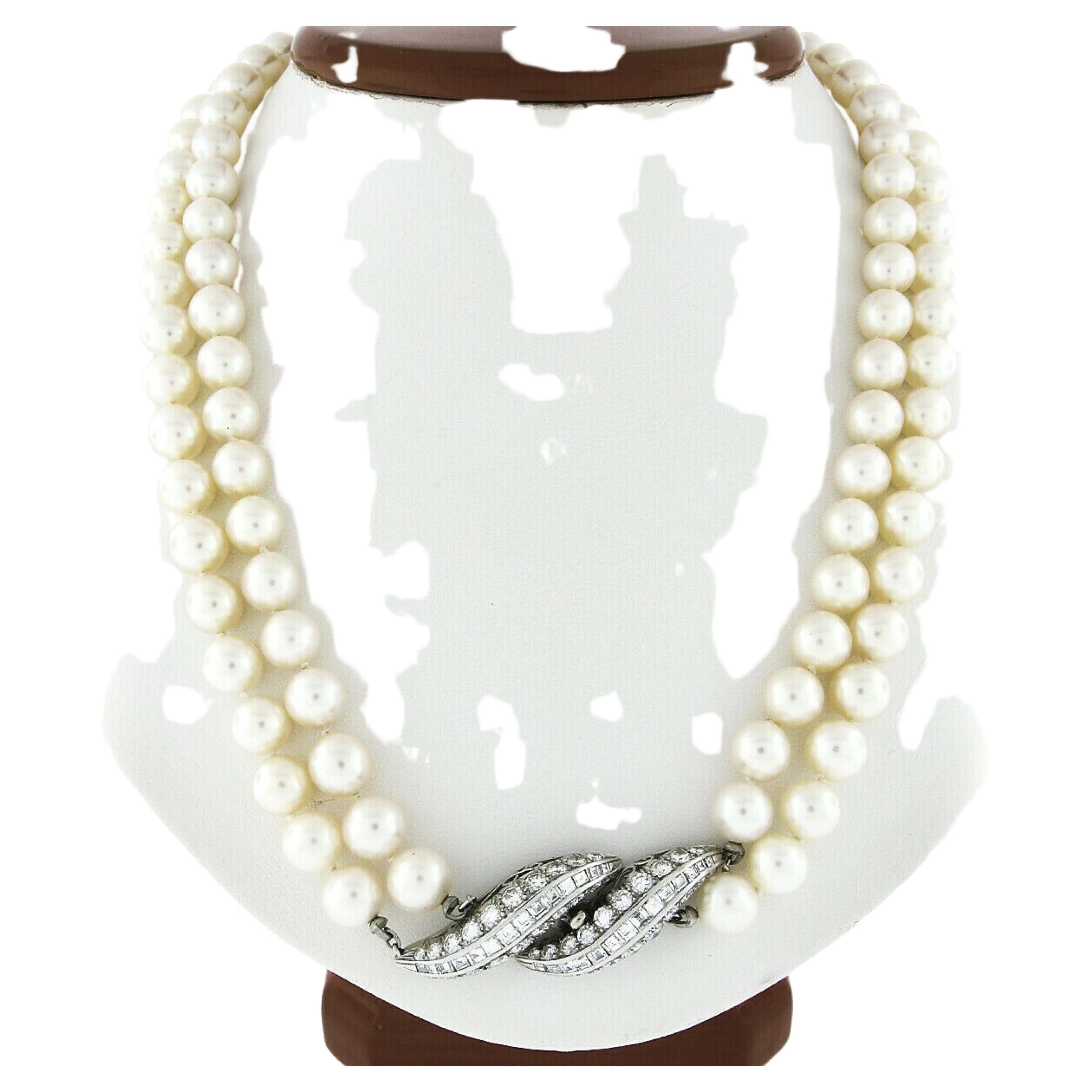 This magnificent vintage dual pearl strand statement necklace is strung with 132 GIA certified cultured Akoya pearls that are near-round in shape. These beautiful pearls are well matched in size and certified as ranging from 7.93mm to 8.44mm each,