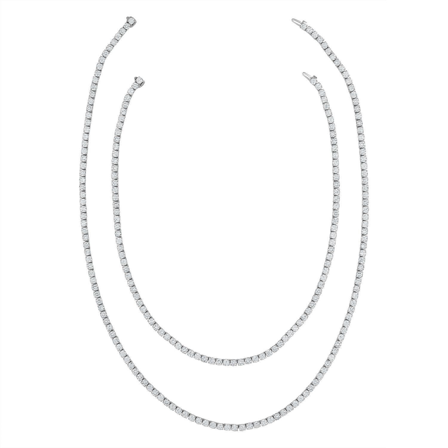 230 Brilliant Diamonds, 55.60 Carat TWT, are set in two separates strings of tennis necklace.
One String is 24.5” Long with 135 Round Brilliants. The Second is 17” Long with 95 Round Brilliants. The Diamonds are Estimated to be F/G in Color and SI