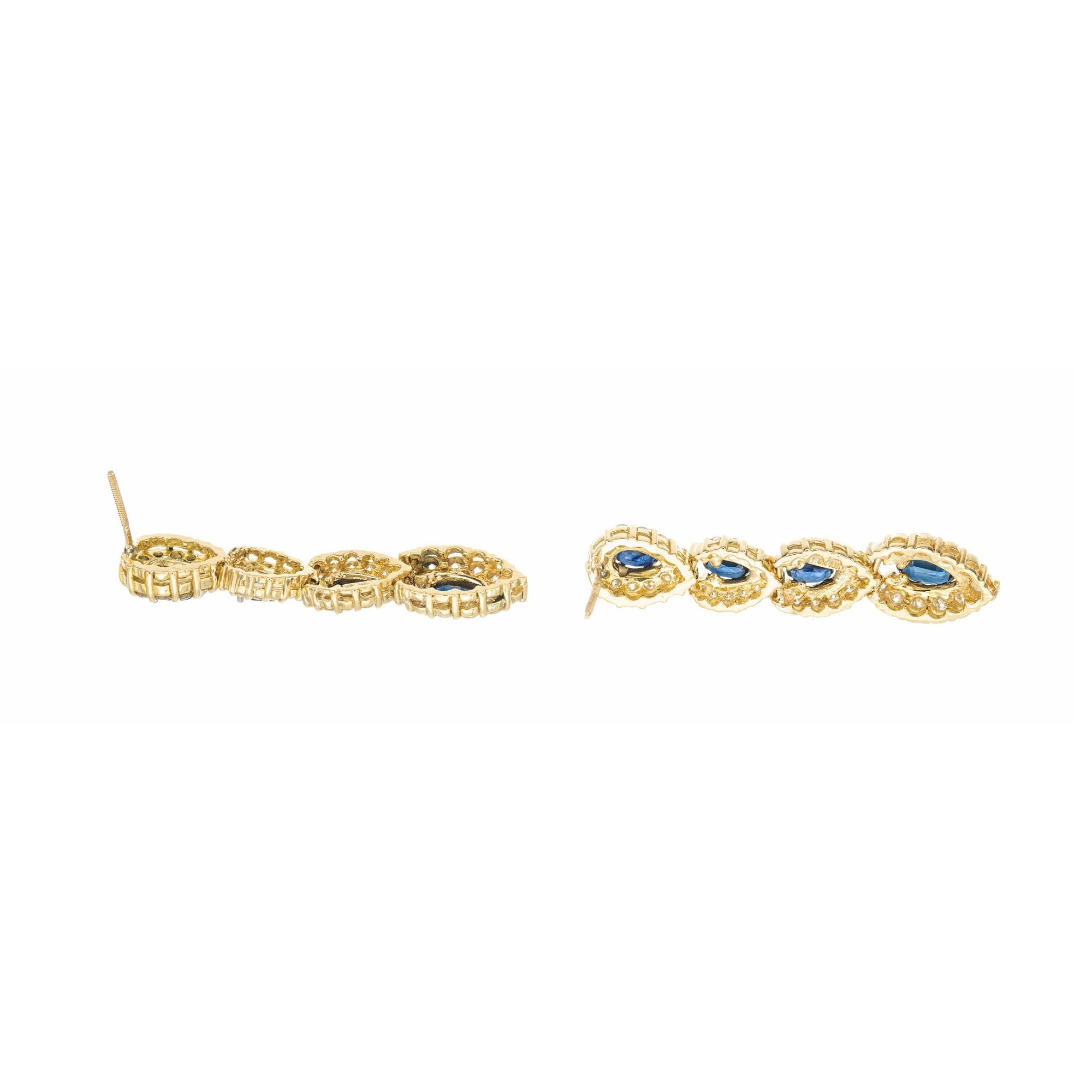 Orecchini a pendente in oro giallo con diamante e zaffiro blu ovale da 2,30 carati In condizioni buone in vendita a Stamford, CT